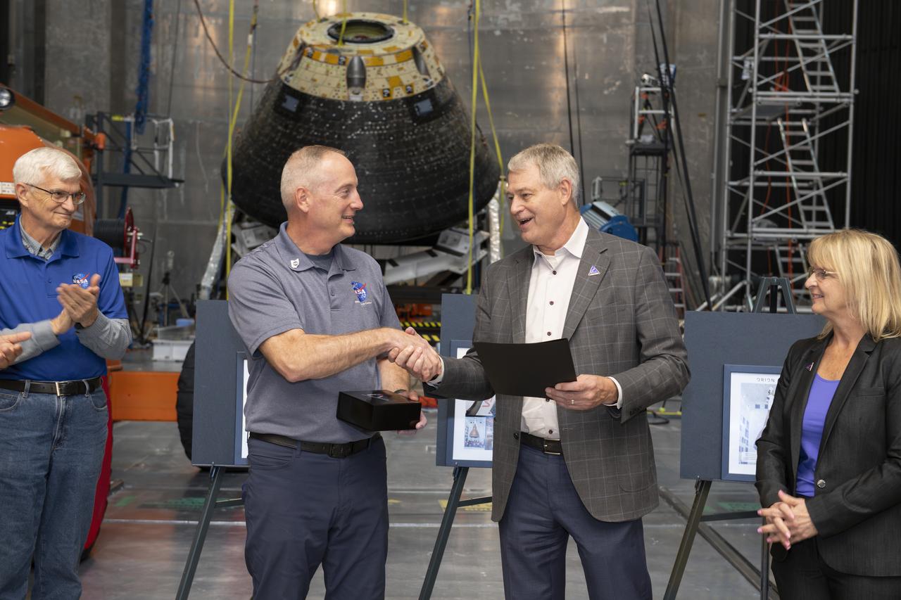 Employees supporting Artemis were invited to attend an appreciation event, “The Road to the Moon,” at Armstrong Test Facility in Sandusky, Ohio.  On Thursday, Nov. 21, please join NASA employees and support service contractors for Artemis Friends and Family Day. Employees had the opportunity to hear from center leadership and see the Orion module that flew around the Moon and back during 2022’s Artemis I mission.   Lockheed Martin presented an article flown on Artemis I to Robert Overy.   Experts have subjected the spacecraft to extreme conditions in Armstrong’s test facilities. This significant testing is slated to wrap up in December, and we want to give you a chance to see the capsule before the conclusion of the test campaign.