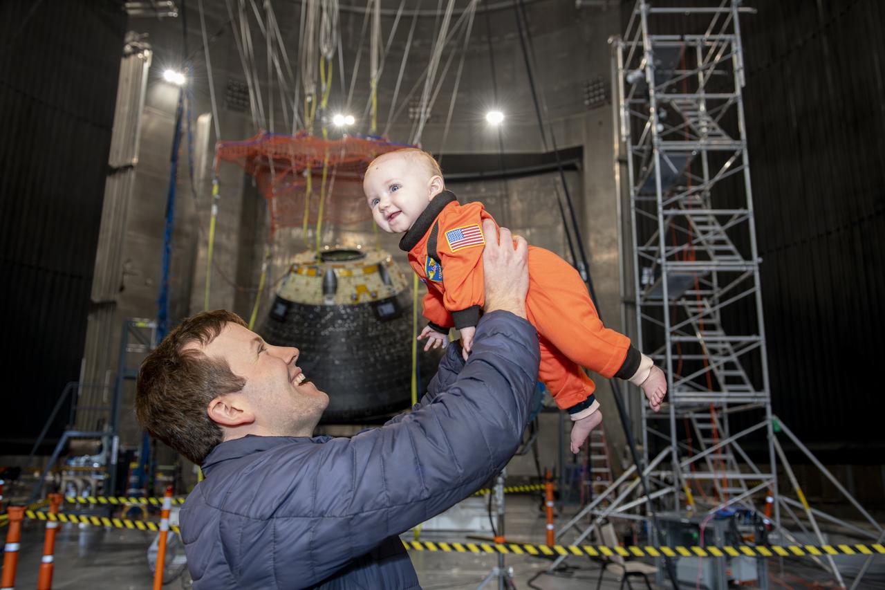 Michael Belair, European Service Module Propulsion Subsystem Manager, with his little astronaut in front of the Orion Crew Module on November 21, 2024. Employees supporting Artemis were invited to attend an appreciation event, “The Road to the Moon,” at Armstrong Test Facility in Sandusky, Ohio.  Experts have subjected the spacecraft to extreme conditions in Armstrong’s test facilities. This significant testing is slated to wrap up in December, and we want to give you a chance to see the capsule before the conclusion of the test campaign. Photo Credit: (NASA/Sara Lowthian-Hanna)