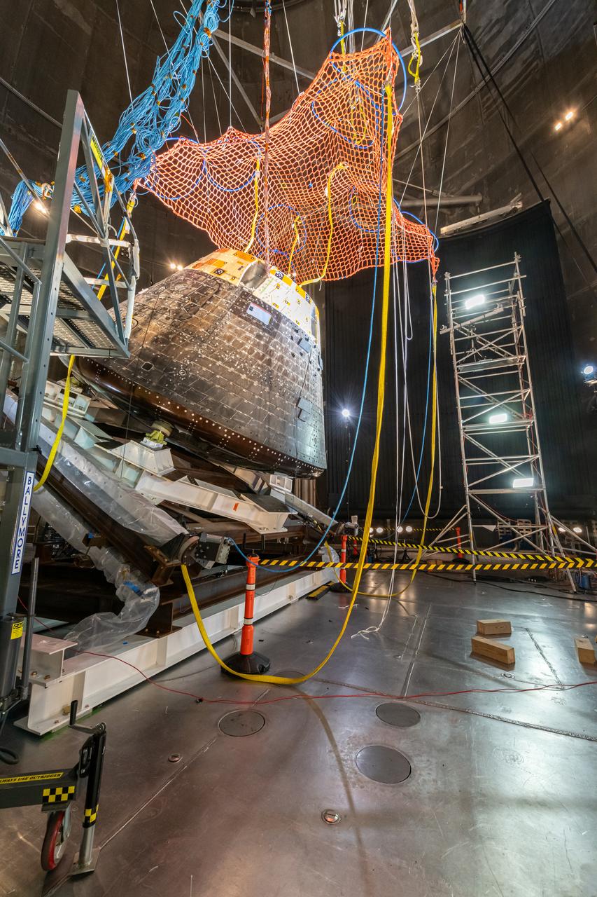 The Orion Crew Module, also known as the Orion Environmental Test Article (ETA), returned to NASA’s Neil Armstrong Test Facility in Sandusky, Ohio, in January 2024 and completed an 11-month test campaign necessary for the safety and success of Artemis II. In November 2024, experts completed the Forward Bay Cover jettison test, which is the last piece that must eject right before parachutes deploy. This image shows the setup right before the FBC deployment test. Photo Credit: (NASA/Jordan Salkin)