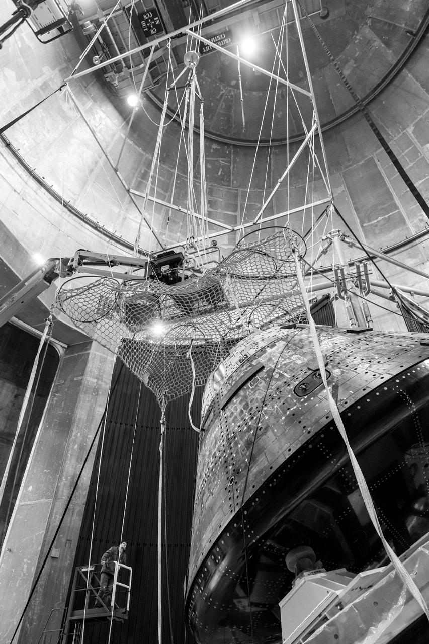 The Orion Crew Module, also known as the Orion Environmental Test Article (ETA), returned to NASA’s Neil Armstrong Test Facility in Sandusky, Ohio, in January 2024 and completed an 11-month test campaign necessary for the safety and success of Artemis II. In November 2024, experts completed the Forward Bay Cover jettison test, which is the last piece that must eject right before parachutes deploy. This image shows the setup right before the FBC deployment test. Photo Credit: (NASA/Jordan Salkin)