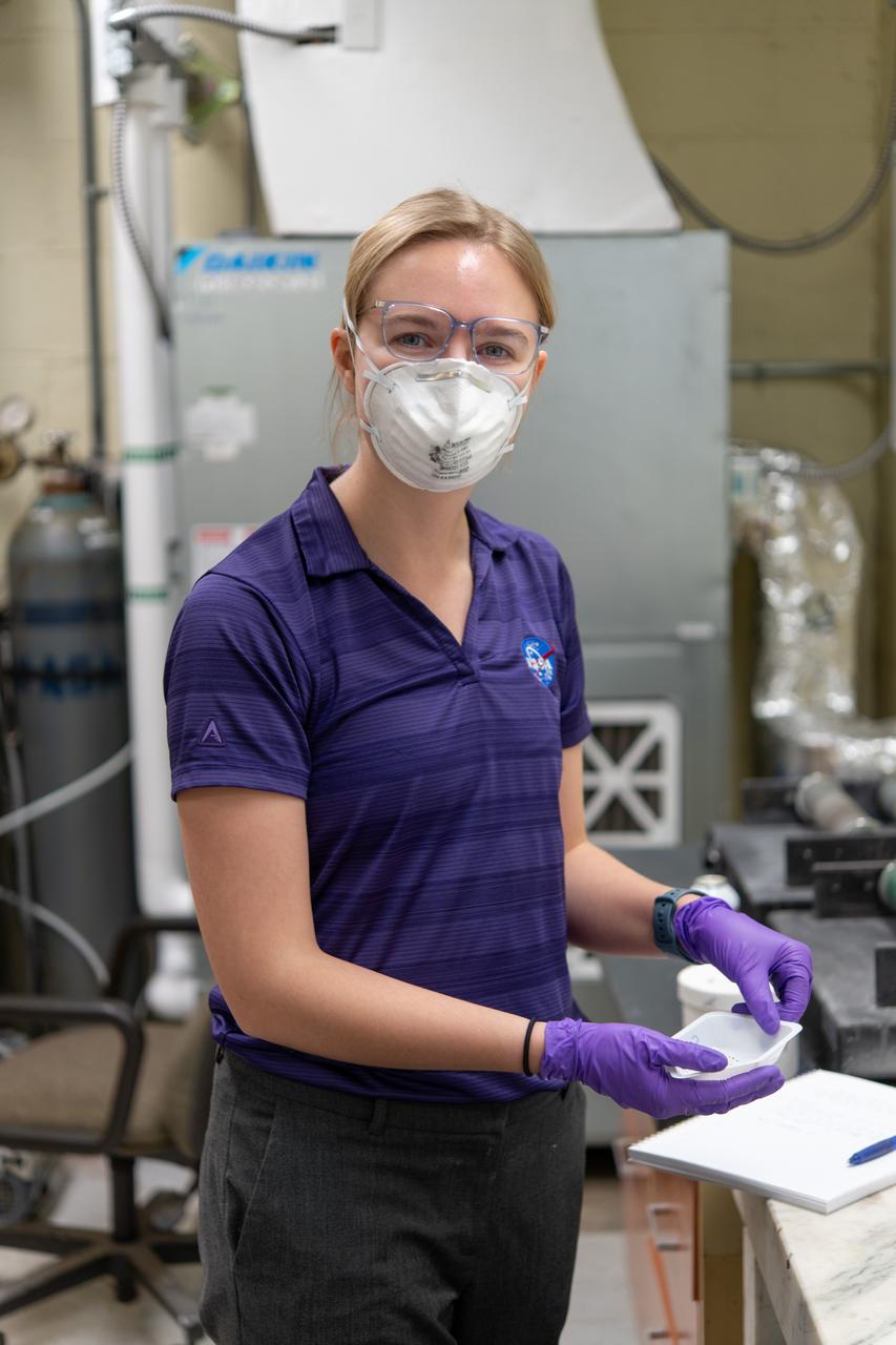 Sylvie Crowell who works in the Environmental Effects and Coatings Branch at NASA Glenn Research Center performs ball milling and particle size analysis on some lunar dust simulant on January 29, 2025.