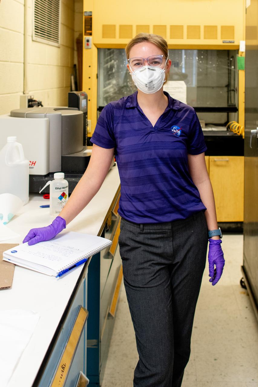 Sylvie Crowell who works in the Environmental Effects and Coatings Branch at NASA Glenn Research Center performs ball milling and particle size analysis on some lunar dust simulant on January 29, 2025. 
