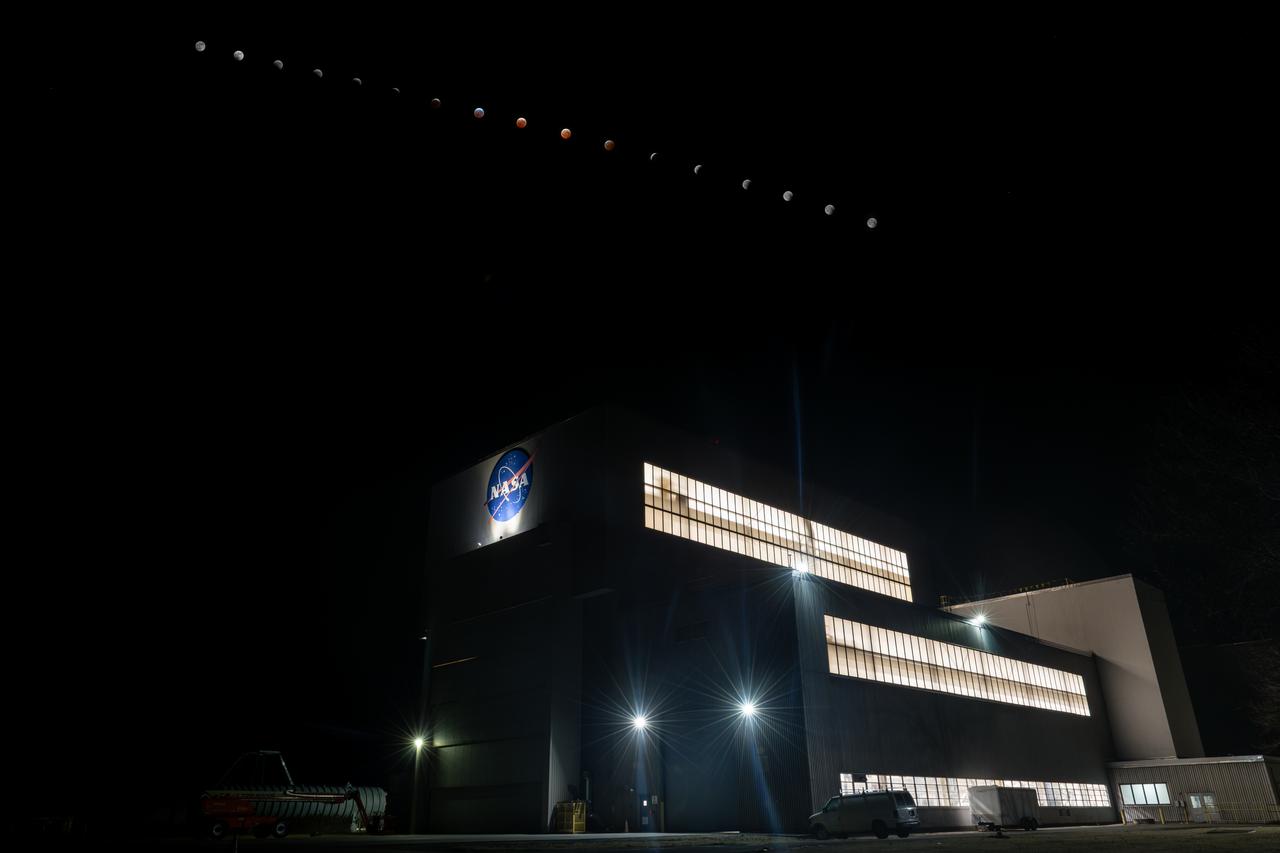  A composite photo made from 18 images of the lunar eclipse above the Space Environments Complex at NASA’s Glenn Research Center at Neil Armstrong Test Facility in Sandusky, Ohio, during the early hours of March 14, 2025. Photo Credit: (NASA/Sara Lowthian-Hanna)