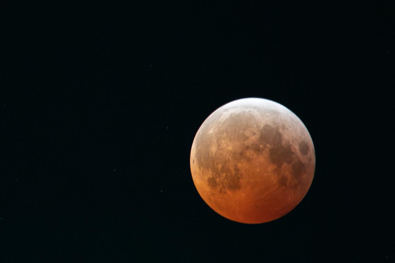 Blood Moon/Lunar Eclipse on March 14th, 2025 seen from Brookpark, OH at NASA Glenn Research Center.. Photo Credit: (NASA/Jordan Cochran)