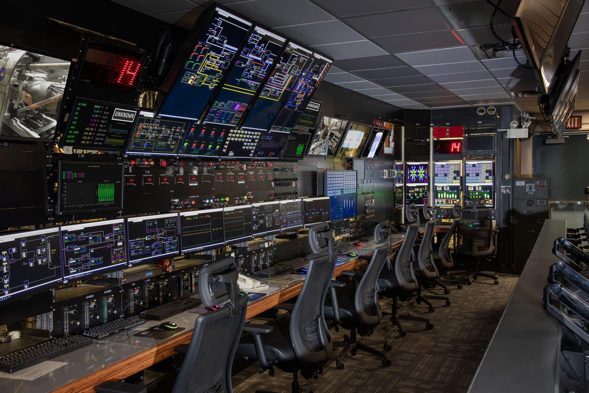 Gunnar Kadlic monitors the data system in the NASA Glenn's Propulsion System Lab (PSL) recently remodeled control room.  This is where jet and rocket engines are tested at GRC.  This re-modeled control room offers better test monitoring and work stations for test engineers and technicians.