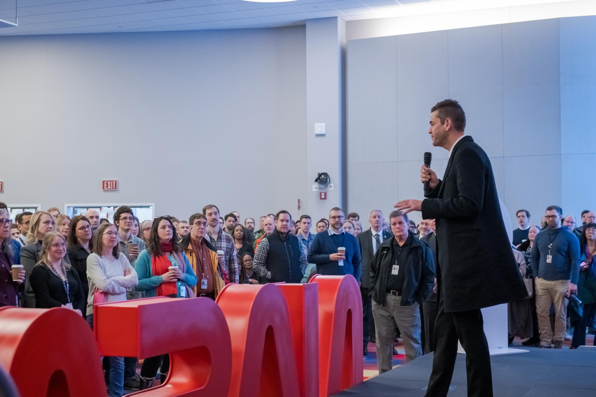 NASA Administrator Jared Isaacman speaks with staff in the Mission Integration Auditorium Center during a visit to NASA's Glenn Research Center in Cleveland on Jan. 27, 2026.