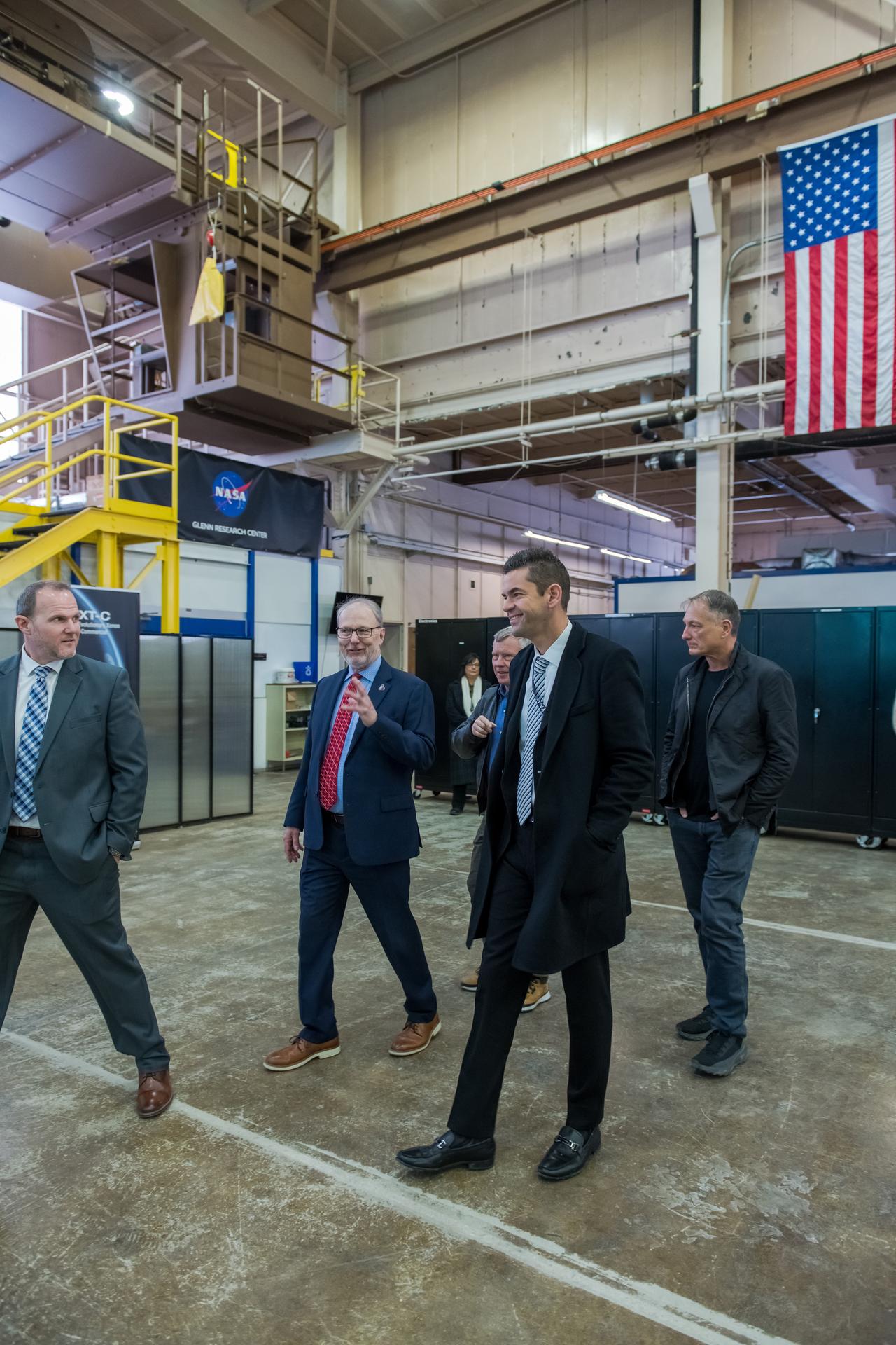 NASA Administrator Jared Isaacman walks with staff through the Electric Propulsion and Power Laboratory during a visit to NASA's Glenn Research Center in Cleveland on Jan. 27, 2026.