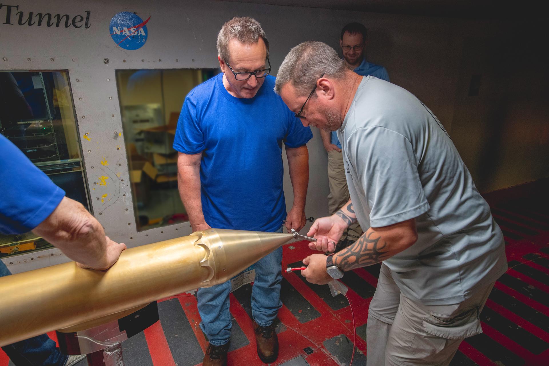 SFD (Subsonic Flight Demonstrator) test of SLD (Supercooled Large Drop) Instrumentation Test - Particle Size Measurements Testing in IRT (Icing Research Tunnel). Installation of probe in the IRT. Installation of 1D2D-X probe in the IRT.  Probe supplied by Science Engineering Associates (SEA)