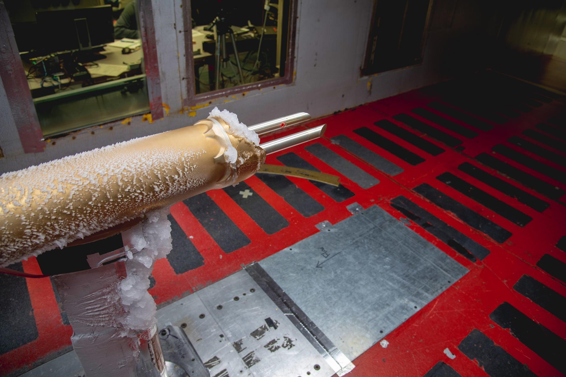Ice collection seen on un-heated sections of the 1D2D-X ice drop detection probe in the test section of the IRT (Icing Research Tunnel). Drop Size Probe testing - SFD (Subsonic Flight Demonstrator) of SLD (Supercooled Large Drop) Instrumentation Test in IRT (Icing Research Tunnel) – Particle Size Distribution Entry, June 8-11, 2026 Large Drop Testing in IRT
