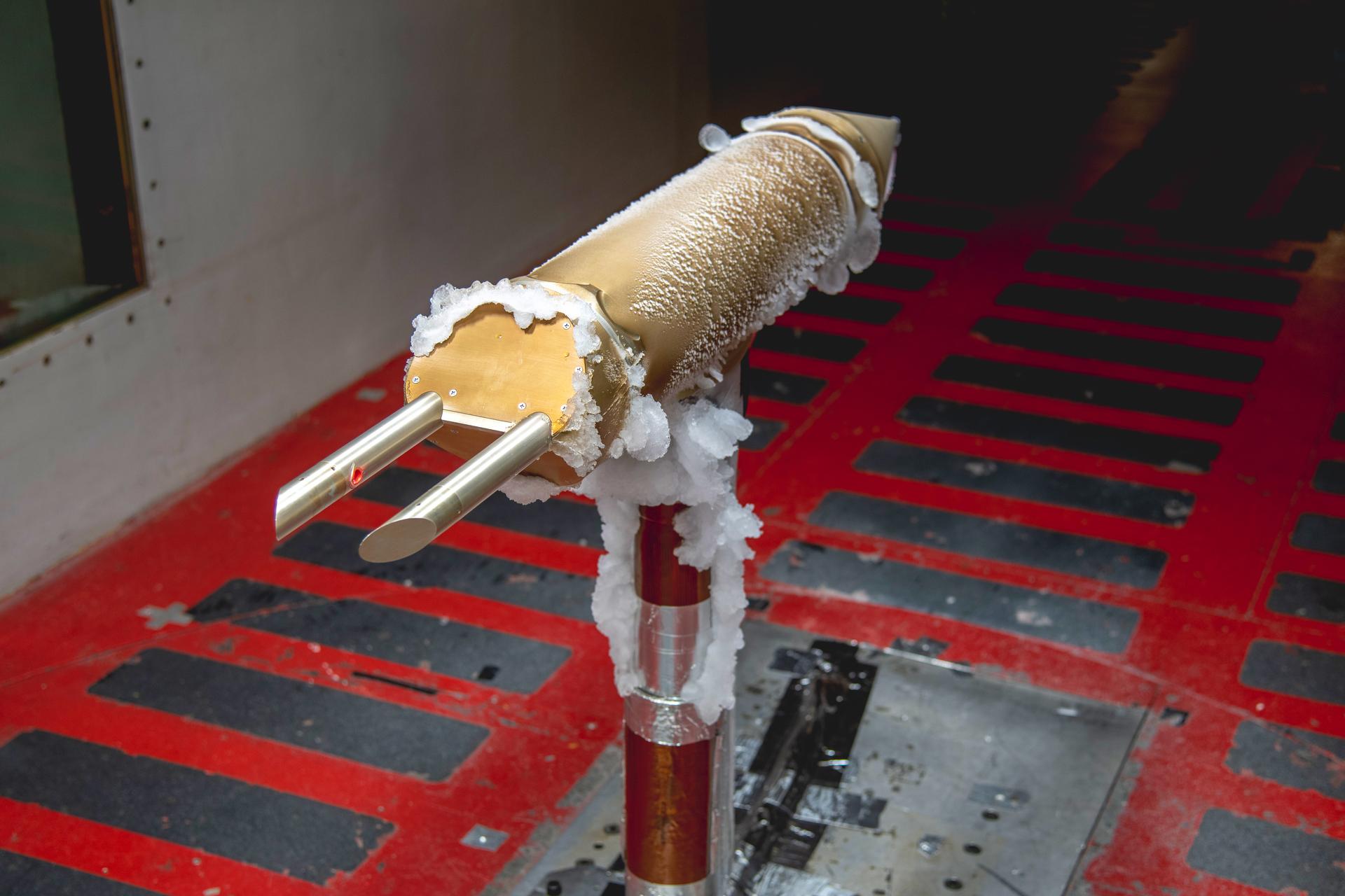 Ice collection seen on un-heated sections of the 1D2D-X ice drop detection probe in the test section of the IRT (Icing Research Tunnel). Drop Size Probe testing - SFD (Subsonic Flight Demonstrator) of SLD (Supercooled Large Drop) Instrumentation Test in IRT (Icing Research Tunnel) – Particle Size Distribution Entry, June 8-11, 2026 Large Drop Testing in IRT