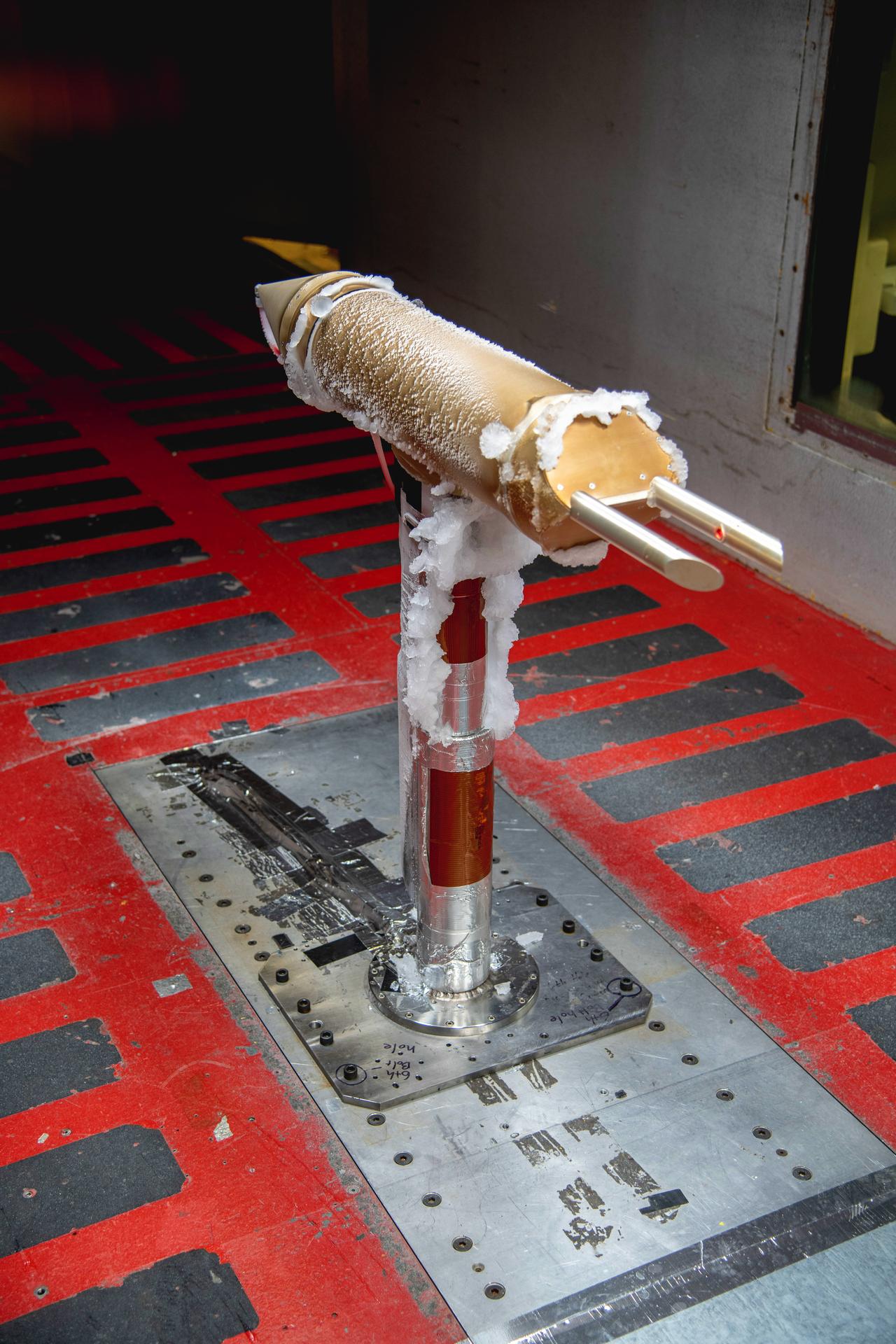 Ice collection seen on un-heated sections of the 1D2D-X ice drop detection probe in the test section of the IRT (Icing Research Tunnel). Drop Size Probe testing - SFD (Subsonic Flight Demonstrator) of SLD (Supercooled Large Drop) Instrumentation Test in IRT (Icing Research Tunnel) – Particle Size Distribution Entry, June 8-11, 2026 Large Drop Testing in IRT