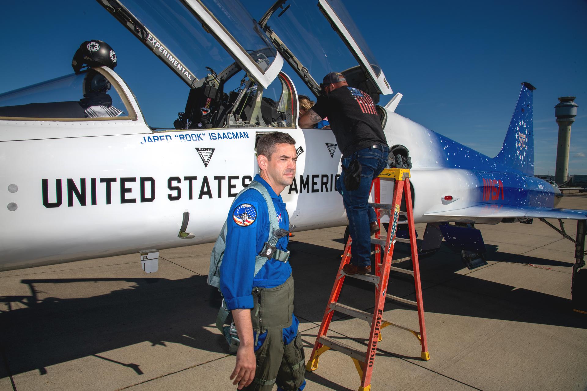 NASA Administrator Jared Isaacman and two GRC employees’ riders fly over the Cleveland browns football game start