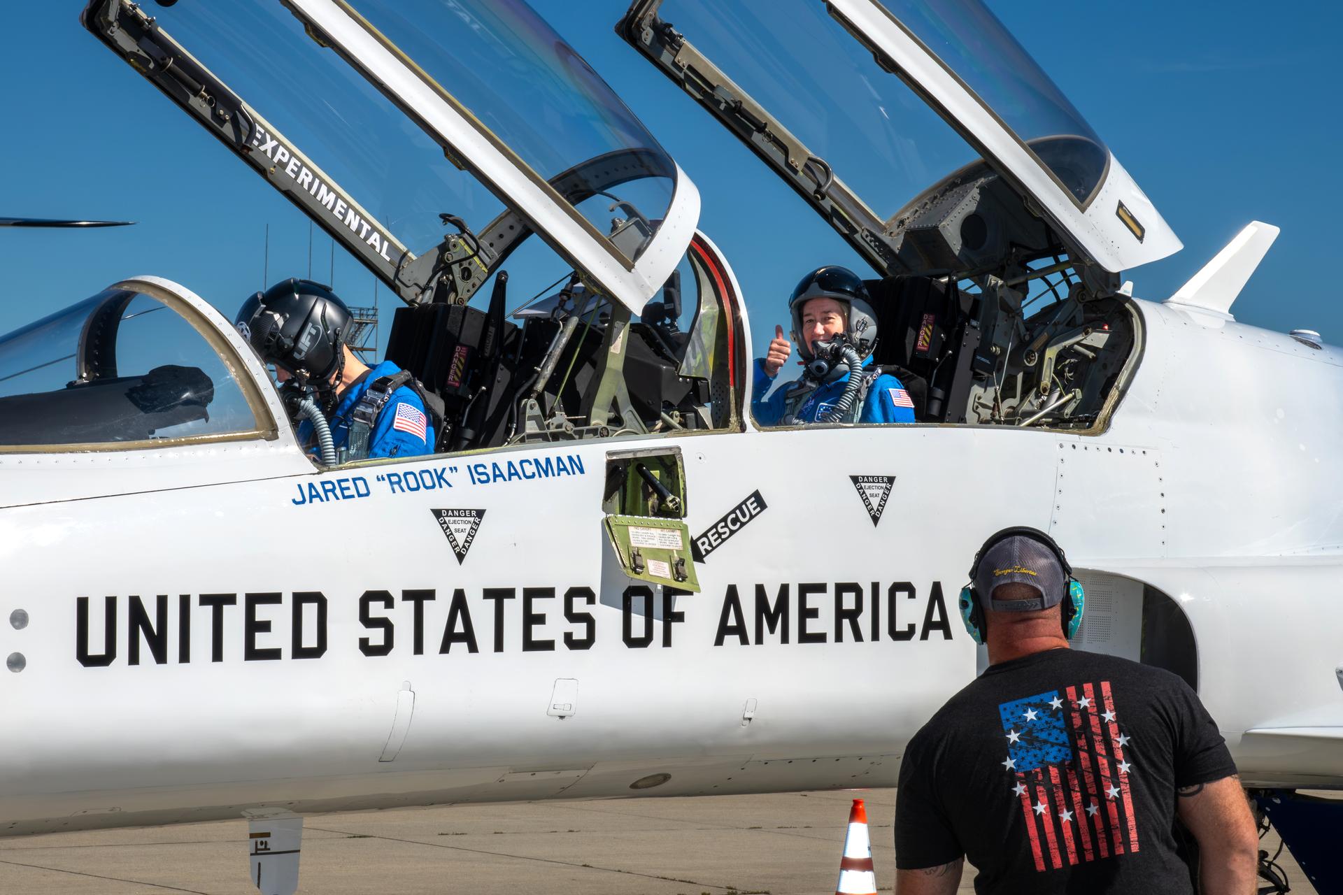 NASA Administrator Jared Isaacman and two GRC employees’ riders fly over the Cleveland browns football game start