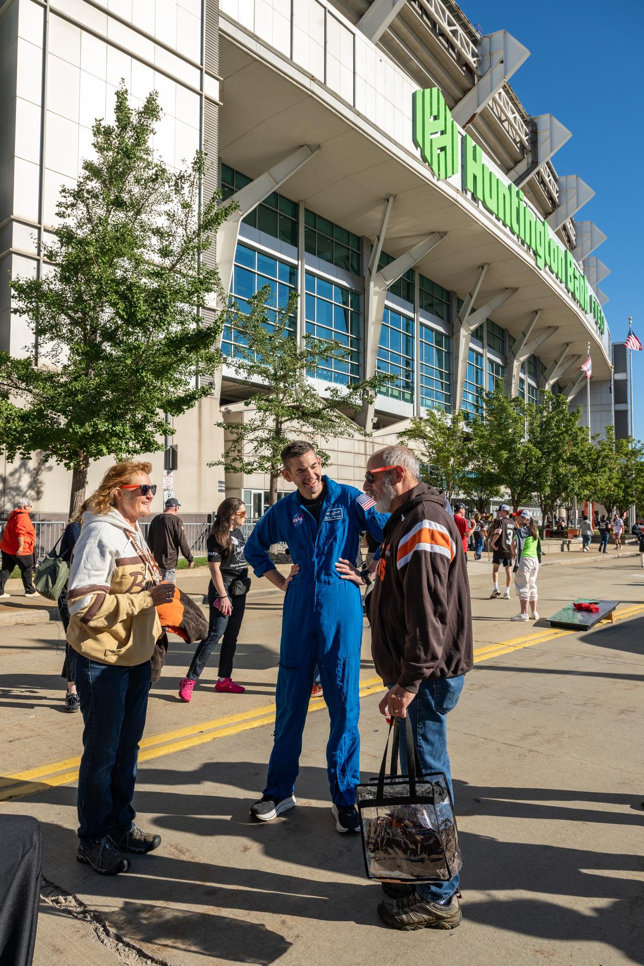 NASA Administrator Jared Isaacman talks with Browns' fans at an NFL game between the Cleveland Browns and the Carolina Panthers at Huntington Bank Field, Sunday, September 27th, 2026, in Cleveland, Ohio. NASA’s engagement at NFL games is part of the agency’s Inspiration Tour, aimed at strengthening connections between NASA and its partners and showcasing innovation in air and space in the lead up to the MAX POWER aerospace technology expo and airshow at the agency’s Kennedy Space Center in early November. Photo Credit: (NASA/Jordan Cochran)
