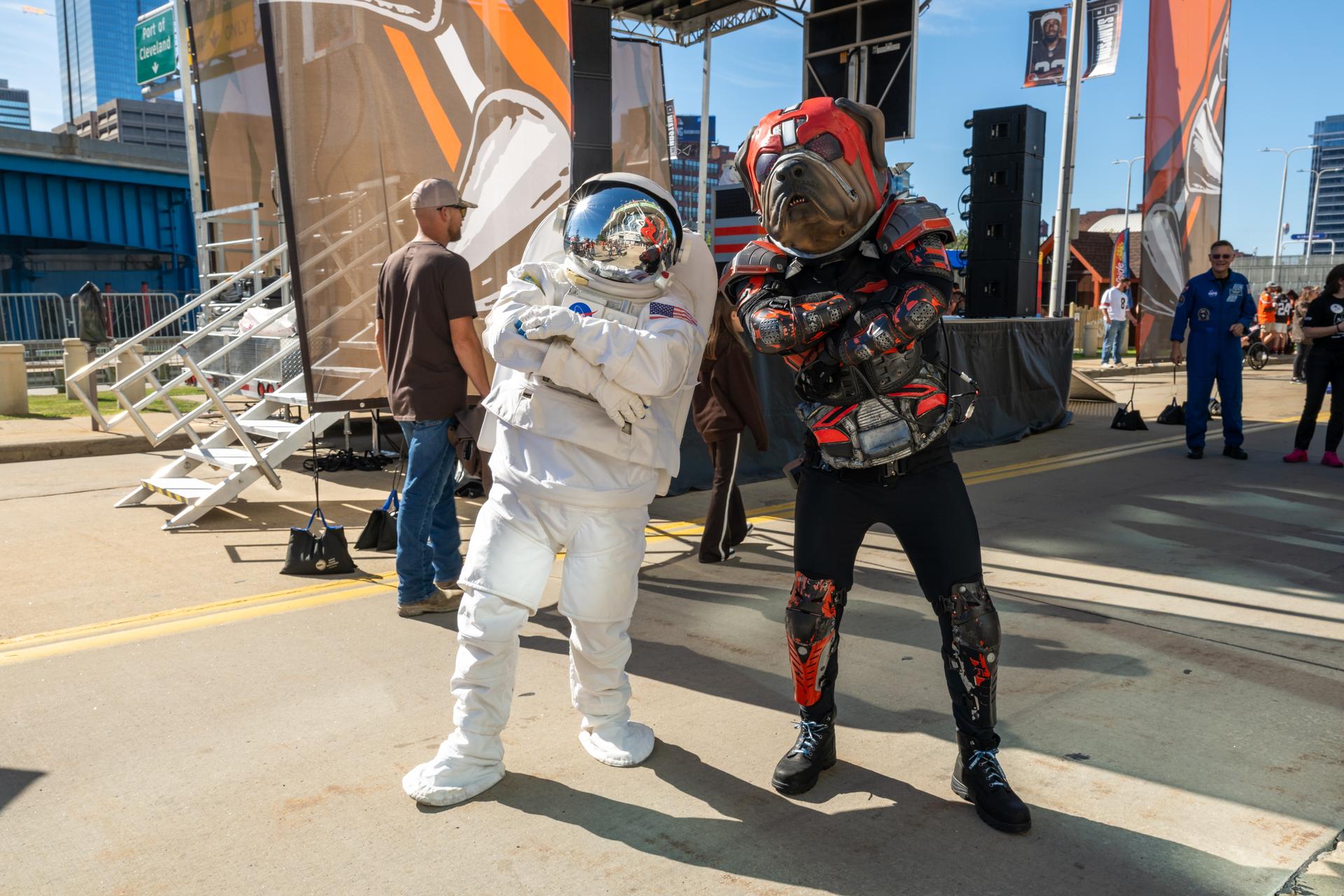 Eva the Astronaut poses with a Browns fan at an NFL game between the Cleveland Browns and the Carolina Panthers at Huntington Bank Field, Sunday, September 27th, 2026, in Cleveland, Ohio. NASA’s engagement at NFL games is part of the agency’s Inspiration Tour, aimed at strengthening connections between NASA and its partners and showcasing innovation in air and space in the lead up to the MAX POWER aerospace technology expo and airshow at the agency’s Kennedy Space Center in early November. Photo Credit: (NASA/Jordan Cochran)