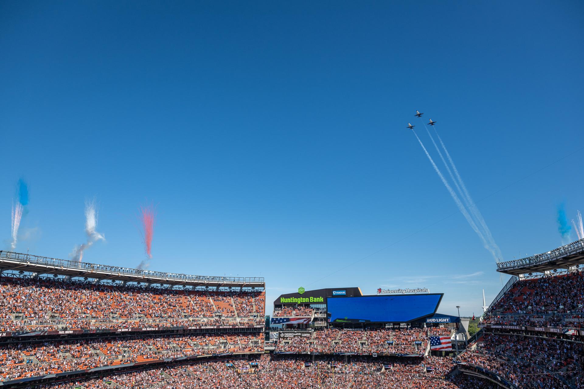 NASA Administrator Jared Isaacman and his Freedom 250 F-5 team (Jerry "Jive" Kerby and Doug "Tut" Demko) preform the Browns' first-ever NASA flyover during the National Anthem at an NFL game between the Cleveland Browns and the Carolina Panthers at Huntington Bank Field, Sunday, September 27th, 2026, in Cleveland, Ohio. NASA’s engagement at NFL games is part of the agency’s Inspiration Tour, aimed at strengthening connections between NASA and its partners and showcasing innovation in air and space in the lead up to the MAX POWER aerospace technology expo and airshow at the agency’s Kennedy Space Center in early November. Photo Credit: (NASA/Jordan Cochran)