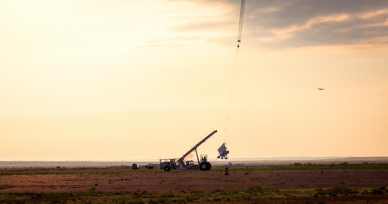 This is EXCITE’s moment of release. On August 31, 2024, the EXCITE (EXoplanet Climate Infrared TElescope) team conducted a test flight of their telescope from NASA’s Columbia Scientific Balloon Facility in Fort Sumner, New Mexico. This photo was taken moments after the telescope was released from the tractor vehicle (called Big Bill). Unseen above is the helium-filled scientific balloon that carried the telescope to the edge of space.