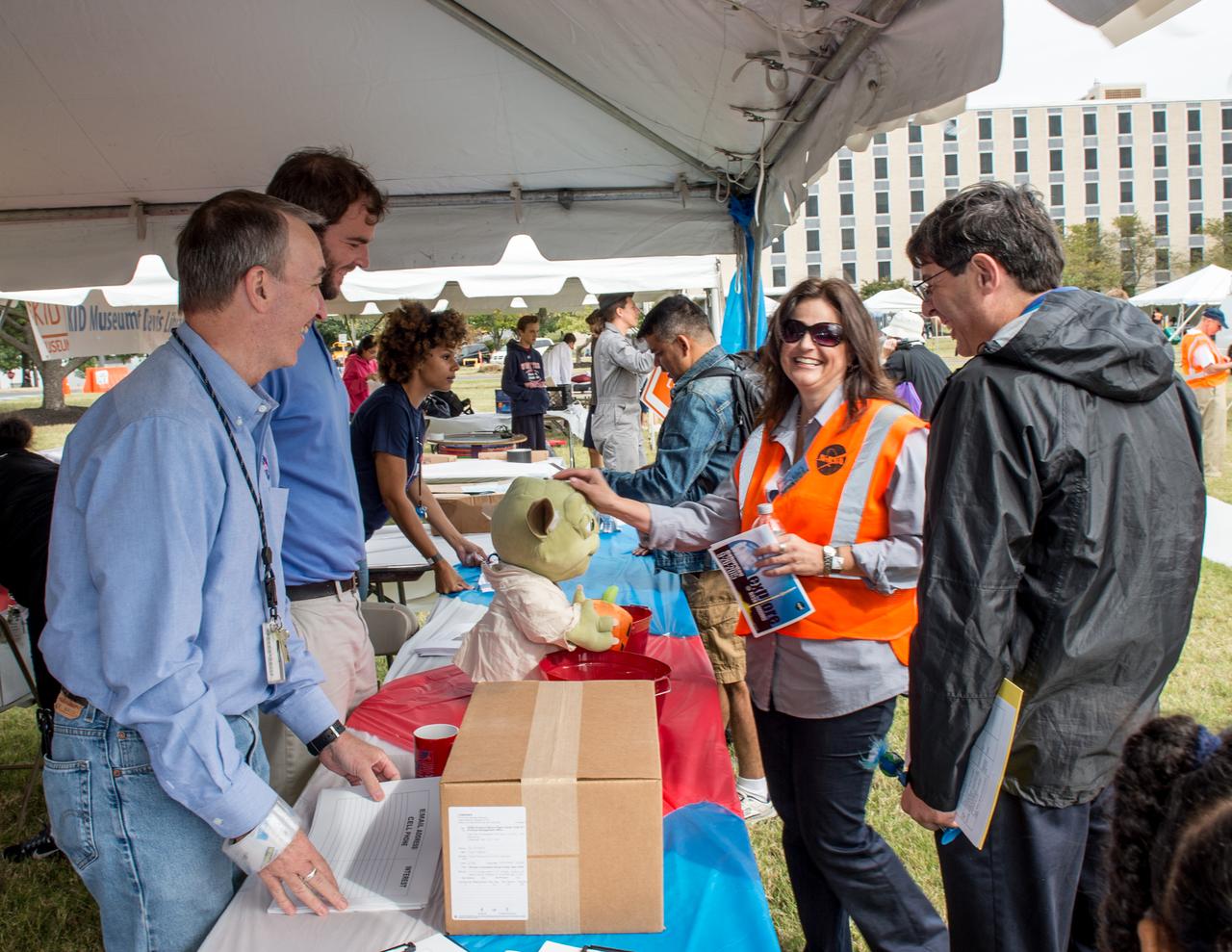 Center Director Chris Scolese visits displays at Explore@NASAGoddard celebrates the 25th anniversary of the launch of the Hubble Space Telescope. All areas of Goddard’s research – Earth science, heliophysics, planetary science, astrophysics, and engineering and technology – will be presented, as each discipline plays a critical part in NASA's ongoing journey to reach new heights.