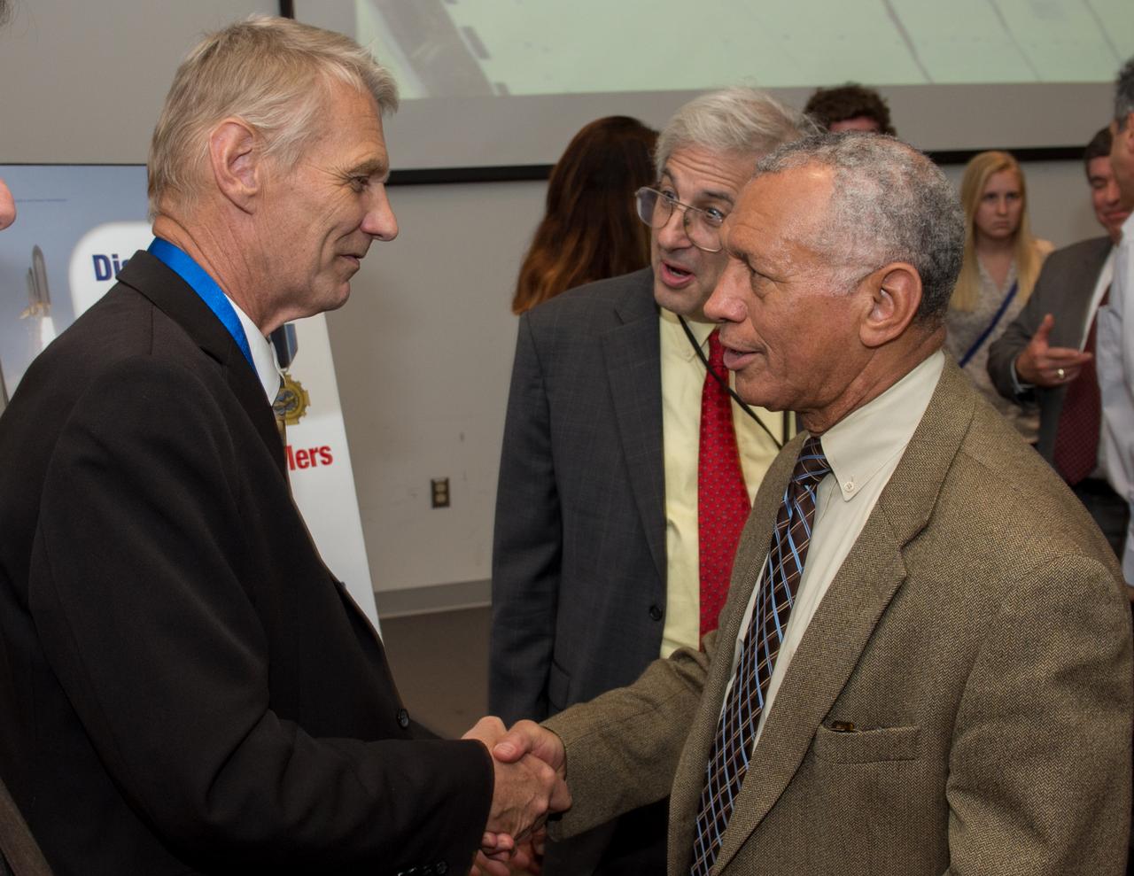 Distinguished Service Award ceremony for Dr. Piers Sellers. NASA Administrator Charlie Bolden