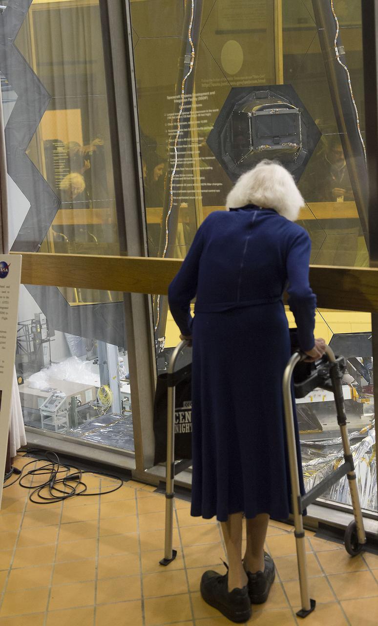Employees viewed James Webb Space Telescope in B29 on March 31, 2017 prior to final phase of integration and testing before 2018 launch. Project personnel were on hand for Q&A and LIVE Facebook event. Pictured here is Nancy Grace Roman “Mother of Hubble” viewing JWST.