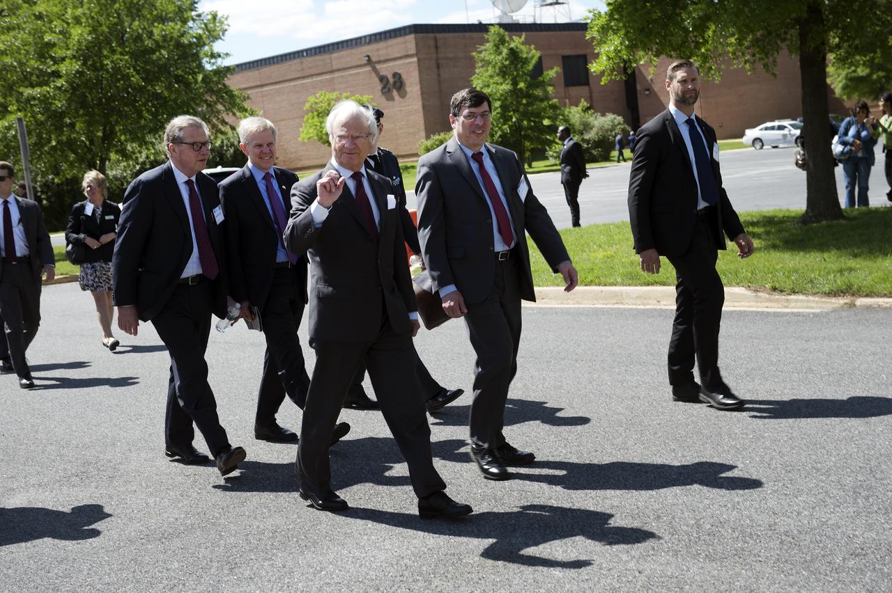 Swedish Delegation visited Goddard on May 3, 2017.  Goddard senior management, the King of Sweden, and members of the Royal Swedish Academy walk to Building 29.
