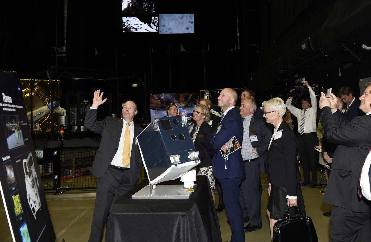 Swedish Delegation visited Goddard on May 3, 2017.  Ben Reed gives Swedish Delegation an overview inside the Robotics Operations Center in Building 29 as part of the tour.