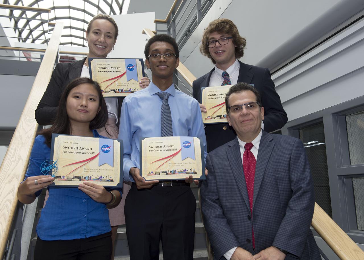 2017 interns participated in a summer poster session at Goddard on August 3, 2017.  Awards were given to top posters in categories of: computer science/IT, engineering, GSFC functional services, and science.  Colleen Hartman, Nancy Abell and Juan Ramon presented awards.