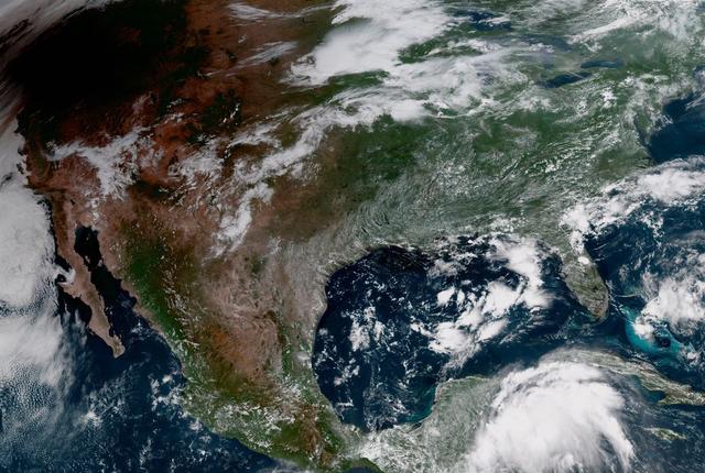 The shadow of the moon blots out the Pacific Northwest in this GOES-16 geocolor image of the 2017 Solar Eclipse. Credit: CIRA View more eclipse imagery at <a href="http://www.nesdis.noaa.gov/content/multimedia" rel="nofollow">www.nesdis.noaa.gov/content/multimedia</a>