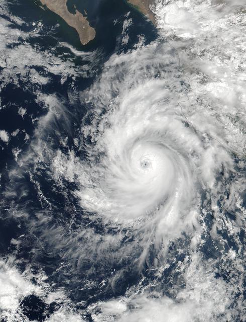 NASA image: NASA Captures Hurricane Dora at Peak Strength, Before Weakening Began