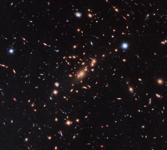 NASA image: Hubble Captures Massive Dead Disk Galaxy that Challenges Theories of Galaxy Evolution