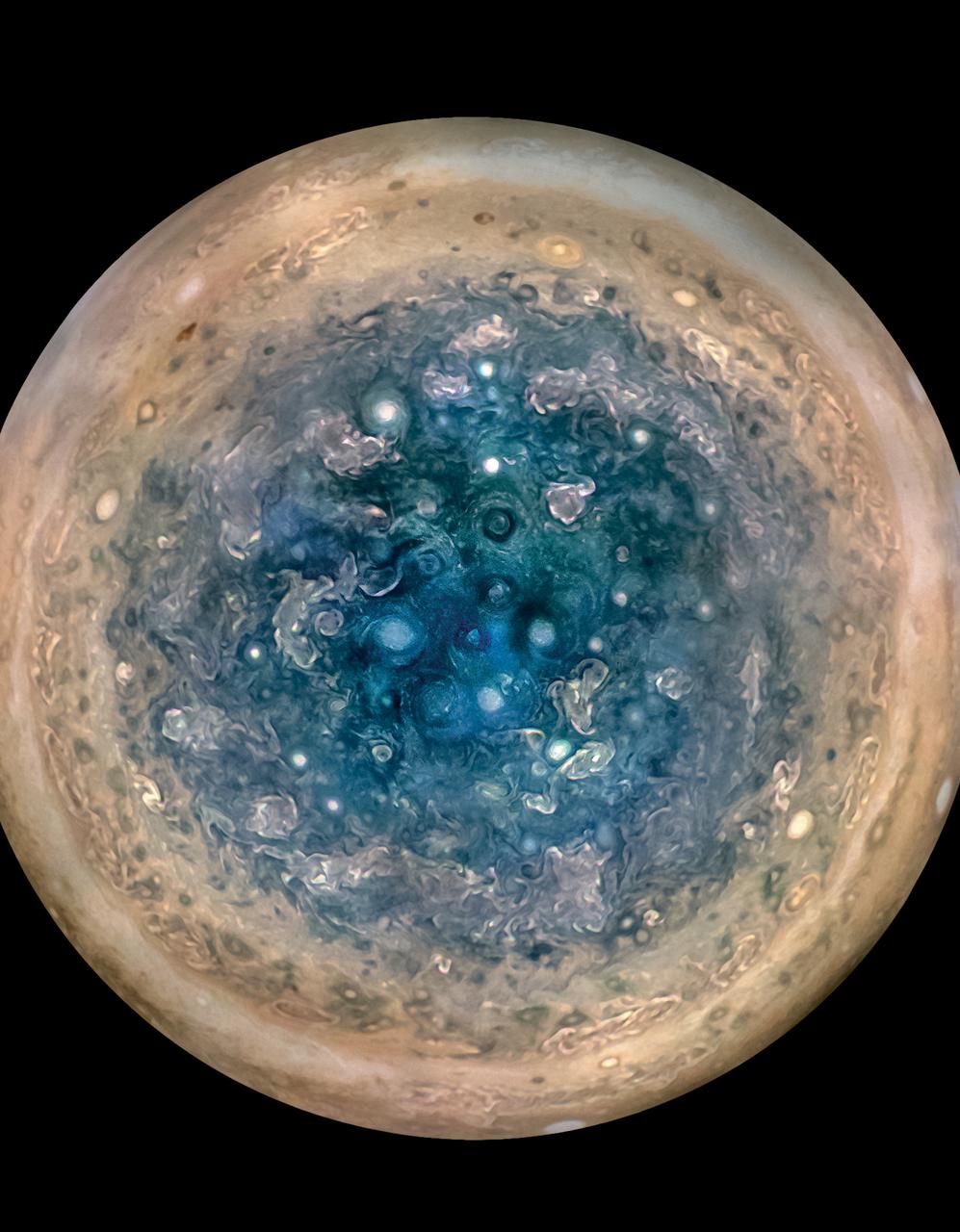 Early science results from NASA’s Juno mission to Jupiter portray the largest planet in our solar system as a complex, gigantic, turbulent world, with Earth-sized polar cyclones, plunging storm systems that travel deep into the heart of the gas giant, and a mammoth, lumpy magnetic field that may indicate it was generated closer to the planet’s surface than previously thought. This image shows Jupiter’s south pole, as seen by NASA’s Juno spacecraft from an altitude of 32,000 miles (52,000 kilometers). The oval features are cyclones, up to 600 miles (1,000 kilometers) in diameter. Multiple images taken with the JunoCam instrument on three separate orbits were combined to show all areas in daylight, enhanced color, and stereographic projection. Read more: <a href="https://go.nasa.gov/2rEgNhT" rel="nofollow">go.nasa.gov/2rEgNhT</a> Credits: NASA/JPL-Caltech/SwRI/MSSS/Betsy Asher Hall/Gervasio Robles <b><a href="http://www.nasa.gov/audience/formedia/features/MP_Photo_Guidelines.html" rel="nofollow">NASA image use policy.</a></b> <b><a href="http://www.nasa.gov/centers/goddard/home/index.html" rel="nofollow">NASA Goddard Space Flight Center</a></b> enables NASA’s mission through four scientific endeavors: Earth Science, Heliophysics, Solar System Exploration, and Astrophysics. Goddard plays a leading role in NASA’s accomplishments by contributing compelling scientific knowledge to advance the Agency’s mission. <b>Follow us on <a href="http://twitter.com/NASAGoddardPix" rel="nofollow">Twitter</a></b> <b>Like us on <a href="http://www.facebook.com/pages/Greenbelt-MD/NASA-Goddard/395013845897?ref=tsd" rel="nofollow">Facebook</a></b> <b>Find us on <a href="http://instagrid.me/nasagoddard/?vm=grid" rel="nofollow">Instagram</a></b>