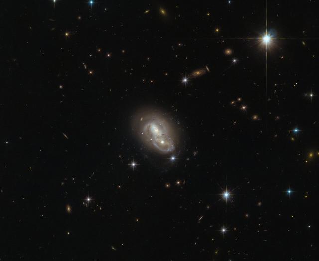 NASA image: Hubble Catches a Galaxy Duo by the "Hare"