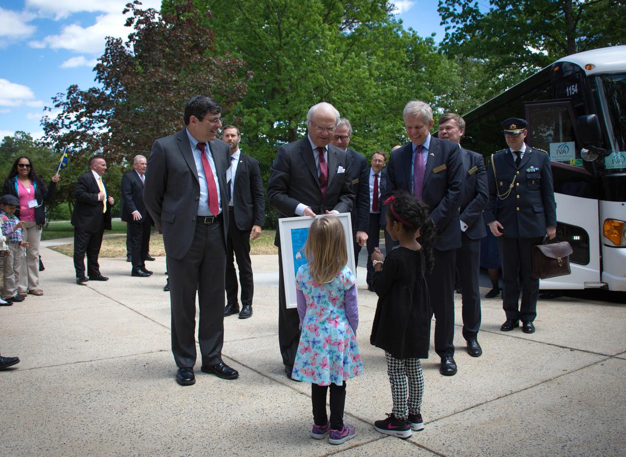 Swedish Delegation Visits GSFC – May 3, 2017 – Goddard Center Director Chris Scolese greets His Majesty Carl XVI Gustaf, King of Sweden outside the entrance to Building 28 at GSFC.  The king’s visit came as part his participation in a large delegation that also included the Swedish Ambassador to the United States, both the chairman and president of the Royal Swedish Academy of Engineering Sciences, as well as distinguished members of Sweden’s industrial, academia and professional organizations.   For the arrival, approximately 60 children from the Goddard Child Development Center were on hand to greet the Swedish delegation.  Photo Credit:  NASA/Goddard/Rebecca Roth   Read more: <a href="https://go.nasa.gov/2p1rP0h" rel="nofollow">go.nasa.gov/2p1rP0h</a>  <b><a href="http://www.nasa.gov/audience/formedia/features/MP_Photo_Guidelines.html" rel="nofollow">NASA image use policy.</a></b>  <b><a href="http://www.nasa.gov/centers/goddard/home/index.html" rel="nofollow">NASA Goddard Space Flight Center</a></b> enables NASA’s mission through four scientific endeavors: Earth Science, Heliophysics, Solar System Exploration, and Astrophysics. Goddard plays a leading role in NASA’s accomplishments by contributing compelling scientific knowledge to advance the Agency’s mission.  <b>Follow us on <a href="http://twitter.com/NASAGoddardPix" rel="nofollow">Twitter</a></b>  <b>Like us on <a href="http://www.facebook.com/pages/Greenbelt-MD/NASA-Goddard/395013845897?ref=tsd" rel="nofollow">Facebook</a></b>  <b>Find us on <a href="http://instagrid.me/nasagoddard/?vm=grid" rel="nofollow">Instagram</a></b>      