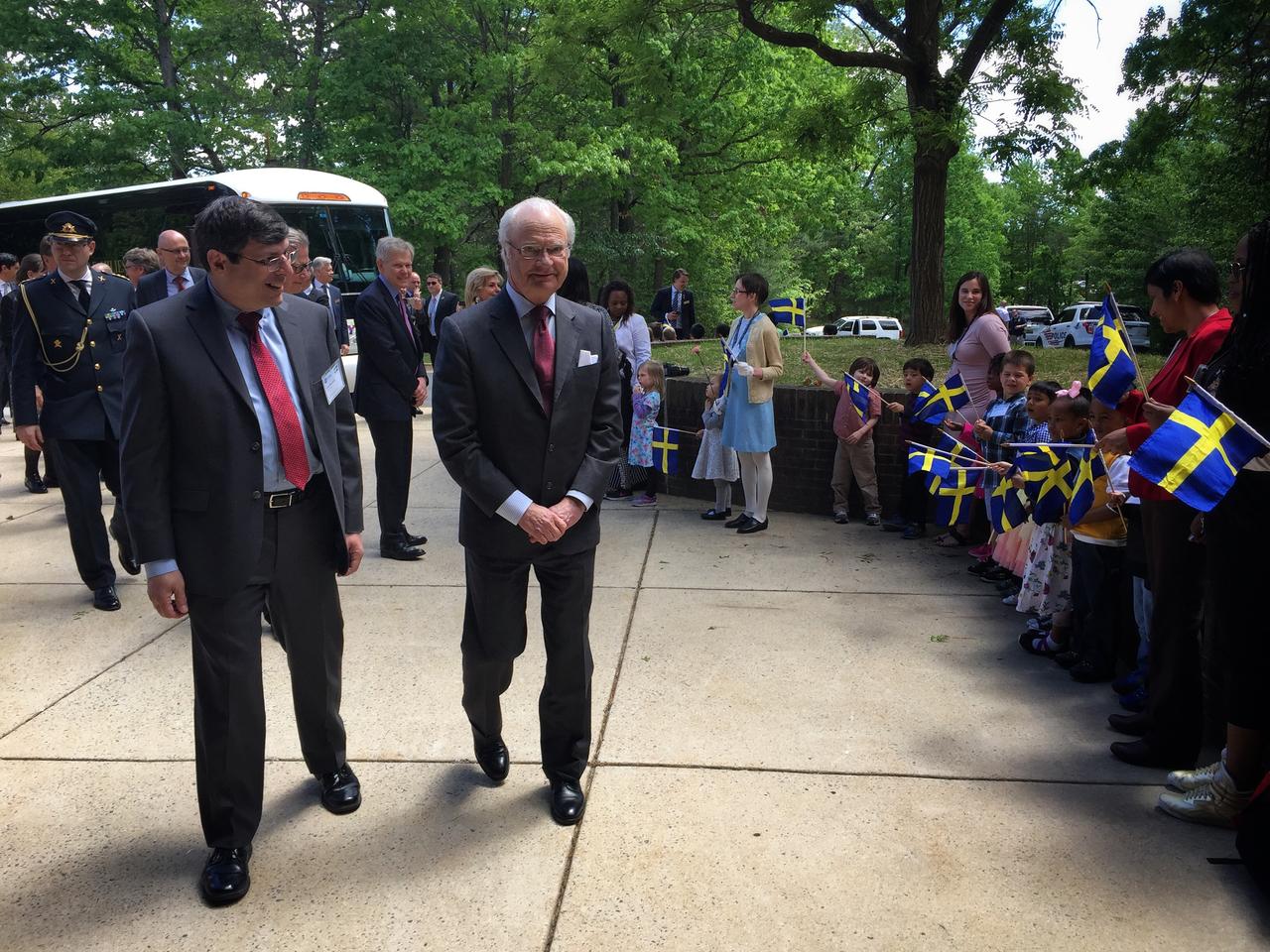 Swedish Delegation Visits GSFC – May 3, 2017 – Goddard Center Director Chris Scolese greets His Majesty Carl XVI Gustaf, King of Sweden outside the entrance to Building 28 at GSFC.  The king’s visit came as part his participation in a large delegation that also included the Swedish Ambassador to the United States, both the chairman and president of the Royal Swedish Academy of Engineering Sciences, as well as distinguished members of Sweden’s industrial, academia and professional organizations.   For the arrival, approximately 60 children from the Goddard Child Development Center were on hand to greet the Swedish delegation.  Photo Credit:  NASA/Goddard/Rebecca Roth   Read more: <a href="https://go.nasa.gov/2p1rP0h" rel="nofollow">go.nasa.gov/2p1rP0h</a>  <b><a href="http://www.nasa.gov/audience/formedia/features/MP_Photo_Guidelines.html" rel="nofollow">NASA image use policy.</a></b>  <b><a href="http://www.nasa.gov/centers/goddard/home/index.html" rel="nofollow">NASA Goddard Space Flight Center</a></b> enables NASA’s mission through four scientific endeavors: Earth Science, Heliophysics, Solar System Exploration, and Astrophysics. Goddard plays a leading role in NASA’s accomplishments by contributing compelling scientific knowledge to advance the Agency’s mission.  <b>Follow us on <a href="http://twitter.com/NASAGoddardPix" rel="nofollow">Twitter</a></b>  <b>Like us on <a href="http://www.facebook.com/pages/Greenbelt-MD/NASA-Goddard/395013845897?ref=tsd" rel="nofollow">Facebook</a></b>  <b>Find us on <a href="http://instagrid.me/nasagoddard/?vm=grid" rel="nofollow">Instagram</a></b>      