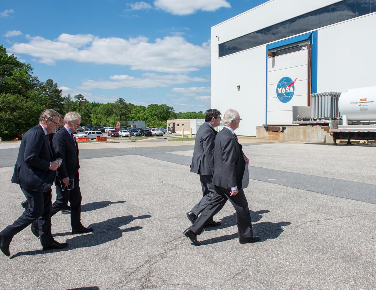 Swedish Delegation Visits GSFC – May 3, 2017 –Goddard Space Flight Center senior management and members of the Royal Swedish Academy walk towards Building 29 as part of the Swedish delegation’s tour of  the center.  Credit: NASA/Goddard/Bill Hrybyk  Read more: <a href="https://go.nasa.gov/2p1rP0h" rel="nofollow">go.nasa.gov/2p1rP0h</a>   <b><a href="http://www.nasa.gov/audience/formedia/features/MP_Photo_Guidelines.html" rel="nofollow">NASA image use policy.</a></b>  <b><a href="http://www.nasa.gov/centers/goddard/home/index.html" rel="nofollow">NASA Goddard Space Flight Center</a></b> enables NASA’s mission through four scientific endeavors: Earth Science, Heliophysics, Solar System Exploration, and Astrophysics. Goddard plays a leading role in NASA’s accomplishments by contributing compelling scientific knowledge to advance the Agency’s mission.  <b>Follow us on <a href="http://twitter.com/NASAGoddardPix" rel="nofollow">Twitter</a></b>  <b>Like us on <a href="http://www.facebook.com/pages/Greenbelt-MD/NASA-Goddard/395013845897?ref=tsd" rel="nofollow">Facebook</a></b>  <b>Find us on <a href="http://instagrid.me/nasagoddard/?vm=grid" rel="nofollow">Instagram</a></b>      