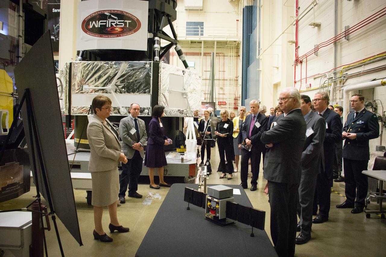 Swedish Delegation Visits GSFC – May 3, 2017 - Members of the Royal Swedish Academy of Engineering Sciences listen to Catherine Peddie, Wide Field Infrared Survey Telescope (WFIRST) Deputy Project Manager use a full-scale model of WFIRST to describe the features of the observatory.  Photo Credit:  NASA/Goddard/Rebecca Roth  Read more: <a href="https://go.nasa.gov/2p1rP0h" rel="nofollow">go.nasa.gov/2p1rP0h</a>  <b><a href="http://www.nasa.gov/audience/formedia/features/MP_Photo_Guidelines.html" rel="nofollow">NASA image use policy.</a></b>  <b><a href="http://www.nasa.gov/centers/goddard/home/index.html" rel="nofollow">NASA Goddard Space Flight Center</a></b> enables NASA’s mission through four scientific endeavors: Earth Science, Heliophysics, Solar System Exploration, and Astrophysics. Goddard plays a leading role in NASA’s accomplishments by contributing compelling scientific knowledge to advance the Agency’s mission.  <b>Follow us on <a href="http://twitter.com/NASAGoddardPix" rel="nofollow">Twitter</a></b>  <b>Like us on <a href="http://www.facebook.com/pages/Greenbelt-MD/NASA-Goddard/395013845897?ref=tsd" rel="nofollow">Facebook</a></b>  <b>Find us on <a href="http://instagrid.me/nasagoddard/?vm=grid" rel="nofollow">Instagram</a></b>      