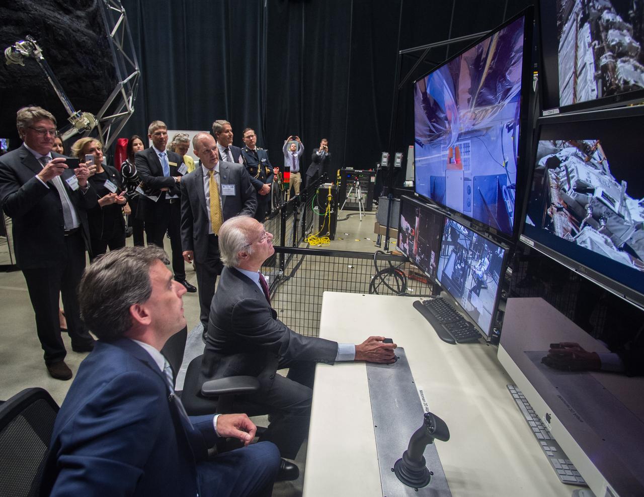 Swedish Delegation Visits GSFC – May 3, 2017 - Members of the Royal Swedish Academy of Engineering Sciences listen to Benjamin Reed, Deputy Division Director of the SatelliteServicing Projects Division about activities happening in Goddard’s Robotic Operations Center in Building 29.  Credit: NASA/Goddard/Bill Hrybyk  Read more: <a href="https://go.nasa.gov/2p1rP0h" rel="nofollow">go.nasa.gov/2p1rP0h</a>  <b><a href="http://www.nasa.gov/audience/formedia/features/MP_Photo_Guidelines.html" rel="nofollow">NASA image use policy.</a></b>  <b><a href="http://www.nasa.gov/centers/goddard/home/index.html" rel="nofollow">NASA Goddard Space Flight Center</a></b> enables NASA’s mission through four scientific endeavors: Earth Science, Heliophysics, Solar System Exploration, and Astrophysics. Goddard plays a leading role in NASA’s accomplishments by contributing compelling scientific knowledge to advance the Agency’s mission.  <b>Follow us on <a href="http://twitter.com/NASAGoddardPix" rel="nofollow">Twitter</a></b>  <b>Like us on <a href="http://www.facebook.com/pages/Greenbelt-MD/NASA-Goddard/395013845897?ref=tsd" rel="nofollow">Facebook</a></b>  <b>Find us on <a href="http://instagrid.me/nasagoddard/?vm=grid" rel="nofollow">Instagram</a></b>      