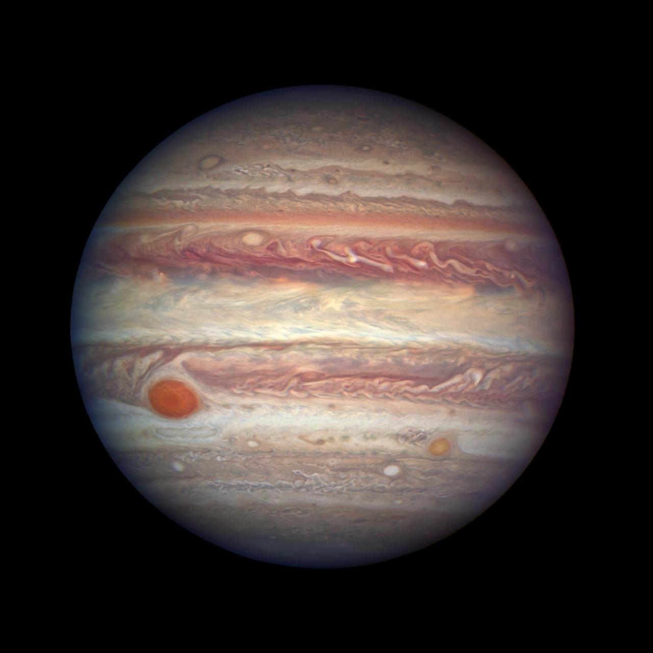 On April 3, 2017, as Jupiter made its nearest approach to Earth in a year, NASA’s Hubble Space Telescope viewed the solar system’s largest planet in all of its up-close glory. At a distance of 415 million miles (668 million kilometers) from Earth, Jupiter offered spectacular views of its colorful, roiling atmosphere, the legendary Great Red Spot, and it smaller companion at farther southern latitudes dubbed “Red Spot Jr.” Read more: <a href="https://go.nasa.gov/2o7tOhH" rel="nofollow">go.nasa.gov/2o7tOhH</a> Photo details: This dazzling Hubble Space Telescope photo of #Jupiter was taken when it was comparatively close to Earth, at a distance of 415 million miles. Hubble reveals the intricate, detailed beauty of Jupiter's clouds as arranged into bands of different latitudes, known as tropical regions. These bands are produced by air flowing in different directions at various latitudes. Lighter colored areas, called zones, are high-pressure where the atmosphere rises. Darker low-pressure regions where air falls are called belts. The planet's trademark, the Great Red Spot, is a long-lived storm roughly the diameter of Earth. Much smaller storms appear as white or brown-colored ovals. Such storms can last as little as a few hours or stretch on for centuries. Credit: NASA, ESA, and A. Simon (NASA Goddard) <b><a href="http://www.nasa.gov/audience/formedia/features/MP_Photo_Guidelines.html" rel="nofollow">NASA image use policy.</a></b> <b><a href="http://www.nasa.gov/centers/goddard/home/index.html" rel="nofollow">NASA Goddard Space Flight Center</a></b> enables NASA’s mission through four scientific endeavors: Earth Science, Heliophysics, Solar System Exploration, and Astrophysics. Goddard plays a leading role in NASA’s accomplishments by contributing compelling scientific knowledge to advance the Agency’s mission. <b>Follow us on <a href="http://twitter.com/NASAGoddardPix" rel="nofollow">Twitter</a></b> <b>Like us on <a href="http://www.facebook.com/pages/Greenbelt-MD/NASA-Goddard/395013845897?ref=tsd" rel="nofollow">Facebook</a></b> <b>Find us on <a href="http://instagrid.me/nasagoddard/?vm=grid" rel="nofollow">Instagram</a></b>