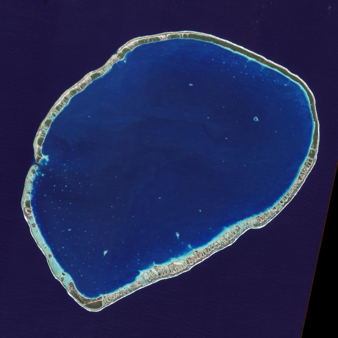 The islands and coral atolls of French Polynesia, located in the southern Pacific Ocean, epitomize the idea of tropical paradise: white sandy beaches, turquoise lagoons, and palm trees. Even from the distance of space, the view of these atolls is beautiful. This image from the Advanced Land Imager on NASA’s Earth Observing-1 (EO-1) satellite shows the southern part of Tikehau Atoll, one of the 78 coral atolls that make up the Tuamotu Archipelago. Patches of coral make star-like spots across the turquoise expanse of the lagoon. A line of tree-covered islets encircles the lagoon. At the southernmost tip of the atoll, a large islet accommodates a small village and an air strip.  NASA image created by Jesse Allen, using EO-1 ALI data provided courtesy of the NASA EO-1 Team. Caption by Rebecca Lindsey.   <b><a href="http://www.nasa.gov/audience/formedia/features/MP_Photo_Guidelines.html" rel="nofollow">NASA image use policy.</a></b>  <b><a href="http://www.nasa.gov/centers/goddard/home/index.html" rel="nofollow">NASA Goddard Space Flight Center</a></b> enables NASA’s mission through four scientific endeavors: Earth Science, Heliophysics, Solar System Exploration, and Astrophysics. Goddard plays a leading role in NASA’s accomplishments by contributing compelling scientific knowledge to advance the Agency’s mission.  <b>Follow us on <a href="http://twitter.com/NASAGoddardPix" rel="nofollow">Twitter</a></b>  <b>Like us on <a href="http://www.facebook.com/pages/Greenbelt-MD/NASA-Goddard/395013845897?ref=tsd" rel="nofollow">Facebook</a></b>  <b>Find us on <a href="http://instagrid.me/nasagoddard/?vm=grid" rel="nofollow">Instagram</a></b>