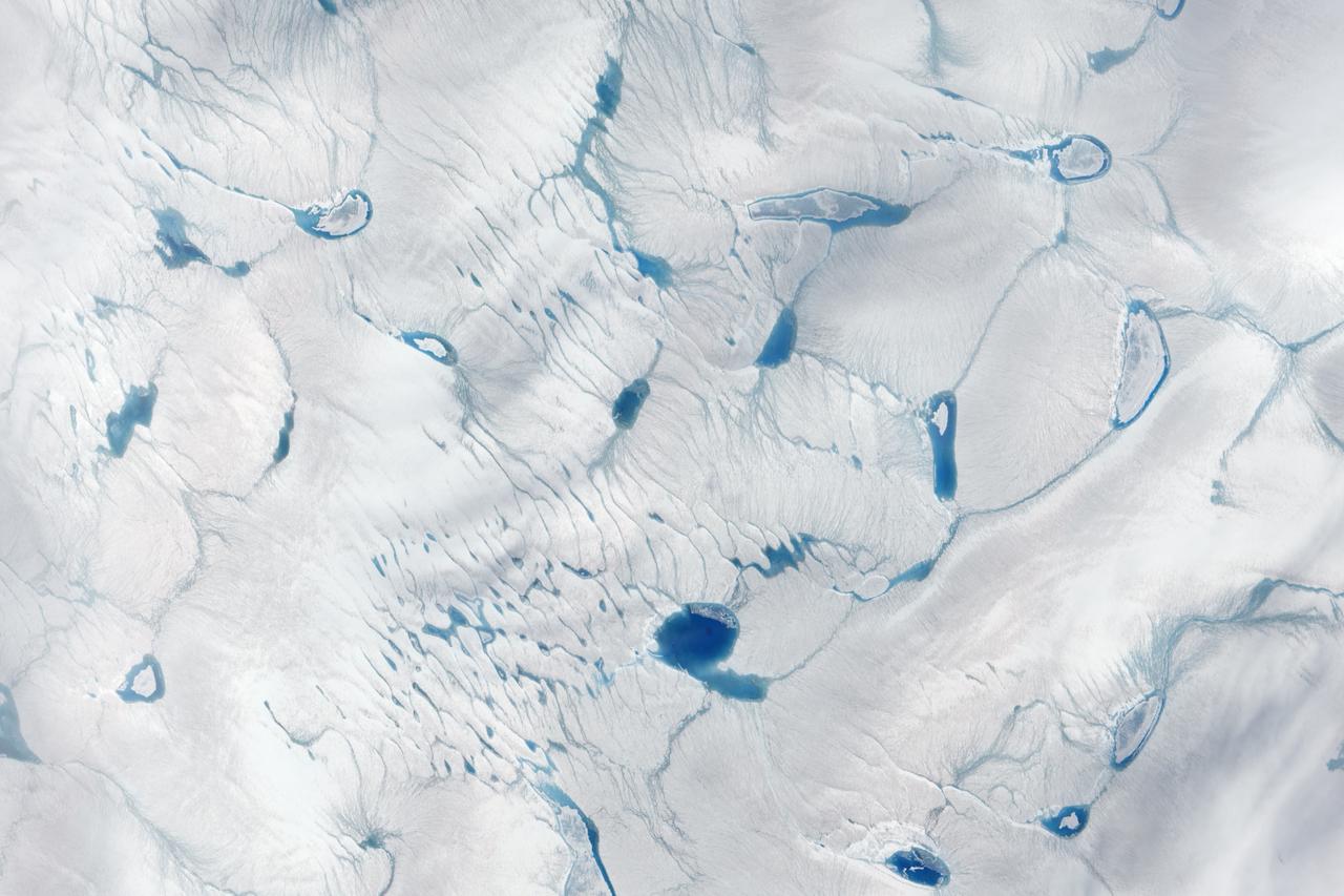 On June 15, 2016, the Advanced Land Imager (ALI) on NASA’s Earth Observing-1 satellite acquired a natural-color image of an area just inland from the coast of southwestern Greenland (120 kilometers southeast of Ilulisat and 500 kilometers north-northeast of Nuuk). According to Marco Tedesco, a professor at Columbia University’s Lamont Doherty Earth Observatory, melting in this area began relatively early in April but was not sustained. It started up again in May and grew into the watery June scene pictured above.  Surface melt can directly contribute to sea level rise via runoff. It can also force its way through crevasses to the base of a glacier, temporarily speeding up ice flow and indirectly contributing to sea level rise. Also, ponding of meltwater can “darken” the ice sheet’s surface and lead to further melting.  Read more: <a href="https://earthobservatory.nasa.gov/IOTD/view.php?id=88288" rel="nofollow">earthobservatory.nasa.gov/IOTD/view.php?id=88288</a>  Credit: NASA Earth Observatory image by Jesse Allen, using EO-1 ALI data provided courtesy of the NASA EO-1 team   <b><a href="http://www.nasa.gov/audience/formedia/features/MP_Photo_Guidelines.html" rel="nofollow">NASA image use policy.</a></b>  <b><a href="http://www.nasa.gov/centers/goddard/home/index.html" rel="nofollow">NASA Goddard Space Flight Center</a></b> enables NASA’s mission through four scientific endeavors: Earth Science, Heliophysics, Solar System Exploration, and Astrophysics. Goddard plays a leading role in NASA’s accomplishments by contributing compelling scientific knowledge to advance the Agency’s mission.  <b>Follow us on <a href="http://twitter.com/NASAGoddardPix" rel="nofollow">Twitter</a></b>  <b>Like us on <a href="http://www.facebook.com/pages/Greenbelt-MD/NASA-Goddard/395013845897?ref=tsd" rel="nofollow">Facebook</a></b>  <b>Find us on <a href="http://instagrid.me/nasagoddard/?vm=grid" rel="nofollow">Instagram</a></b>