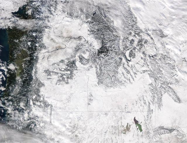 Extreme rain events have been affecting California and snow has blanketed the Pacific Northwest. This visible image from NASA's Aqua satellite on Jan. 6, 2017, at 3:35 p.m. EST (20:35 UTC) shows snow cover in the U.S. Pacific Northwest in Washington, Idaho, Oregon, northern California and Nevada.  On Jan. 9, another area of low pressure moved over Oregon, where the National Weather Service is forecasting heavy snows.  It was the same week last year that the West Coast endured a similar bout of very wet weather. Heavy rain affected the Pacific coast in 2016 during the same week from Jan. 5 through Jan. 7, as a progression of storm systems in the Eastern Pacific Ocean hit southern California and generated flooding and mudslides.  For updated forecasts, visit the National Weather Service website at: <a href="http://www.weather.gov" rel="nofollow">www.weather.gov</a>  Learn more about NASA's view of the storm: <a href="http://go.nasa.gov/2j0xpvW" rel="nofollow">go.nasa.gov/2j0xpvW</a>  Credits: NASA Goddard MODIS Rapid Response  <b><a href="http://www.nasa.gov/audience/formedia/features/MP_Photo_Guidelines.html" rel="nofollow">NASA image use policy.</a></b>  <b><a href="http://www.nasa.gov/centers/goddard/home/index.html" rel="nofollow">NASA Goddard Space Flight Center</a></b> enables NASA’s mission through four scientific endeavors: Earth Science, Heliophysics, Solar System Exploration, and Astrophysics. Goddard plays a leading role in NASA’s accomplishments by contributing compelling scientific knowledge to advance the Agency’s mission.  <b>Follow us on <a href="http://twitter.com/NASAGoddardPix" rel="nofollow">Twitter</a></b>  <b>Like us on <a href="http://www.facebook.com/pages/Greenbelt-MD/NASA-Goddard/395013845897?ref=tsd" rel="nofollow">Facebook</a></b>  <b>Find us on <a href="http://instagrid.me/nasagoddard/?vm=grid" rel="nofollow">Instagram</a></b>  