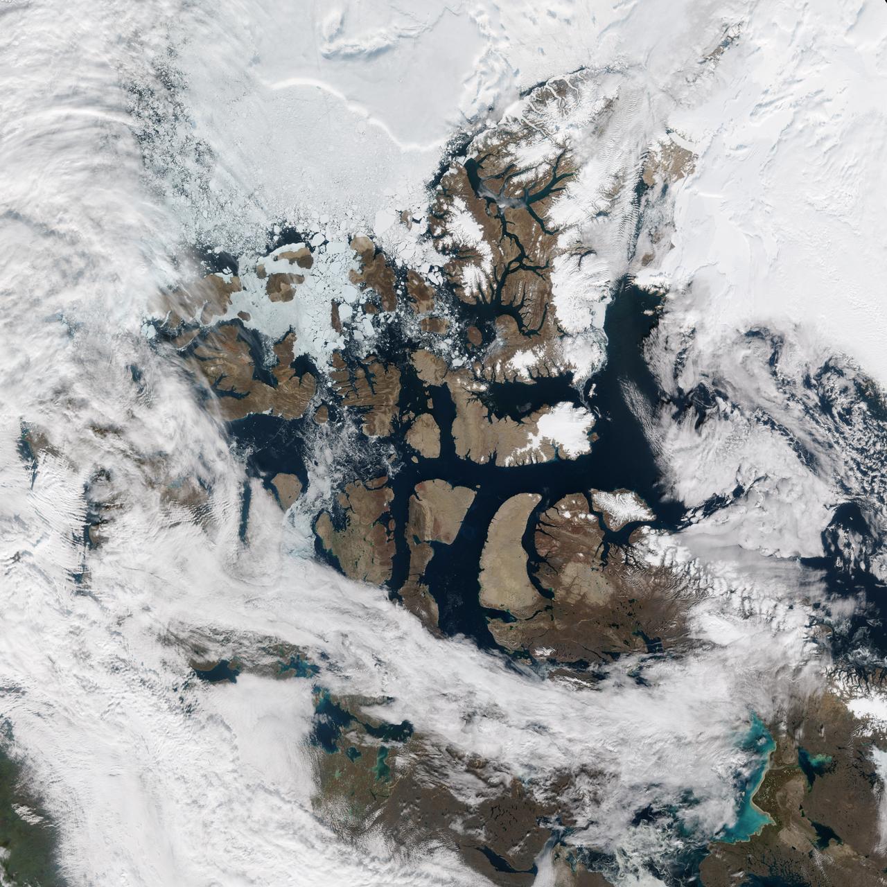 There was a time when the Northwest Passage was a sort of maritime Holy Grail, a route so desired and sought after, but so elusive. For most of the recorded history of North America, the Passage has been nearly impassable and often deadly. But with the modernization of ships and the warming of the Earth, cruising and sailing through the Canadian Archipelago from Baffin Bay to the Beaufort Sea has grown more common and easier. But it’s not necessarily easy.  The top image above shows the Northwest Passage as it appeared on August 31, 2015, to the Visible Infrared Imaging Radiometer Suite (VIIRS) on the Suomi-NPP satellite.  Read more: <a href="http://earthobservatory.nasa.gov/IOTD/view.php?id=86589" rel="nofollow">earthobservatory.nasa.gov/IOTD/view.php?id=86589</a>  NASA Earth Observatory images by Jesse Allen, using VIIRS data from the Suomi National Polar-orbiting Partnership. Suomi NPP is the result of a partnership between NASA, the National Oceanic and Atmospheric Administration, and the Department of Defense.   <b><a href="http://www.nasa.gov/audience/formedia/features/MP_Photo_Guidelines.html" rel="nofollow">NASA image use policy.</a></b>  <b><a href="http://www.nasa.gov/centers/goddard/home/index.html" rel="nofollow">NASA Goddard Space Flight Center</a></b> enables NASA’s mission through four scientific endeavors: Earth Science, Heliophysics, Solar System Exploration, and Astrophysics. Goddard plays a leading role in NASA’s accomplishments by contributing compelling scientific knowledge to advance the Agency’s mission.  <b>Follow us on <a href="http://twitter.com/NASAGoddardPix" rel="nofollow">Twitter</a></b>  <b>Like us on <a href="http://www.facebook.com/pages/Greenbelt-MD/NASA-Goddard/395013845897?ref=tsd" rel="nofollow">Facebook</a></b>  <b>Find us on <a href="http://instagrid.me/nasagoddard/?vm=grid" rel="nofollow">Instagram</a></b> 
