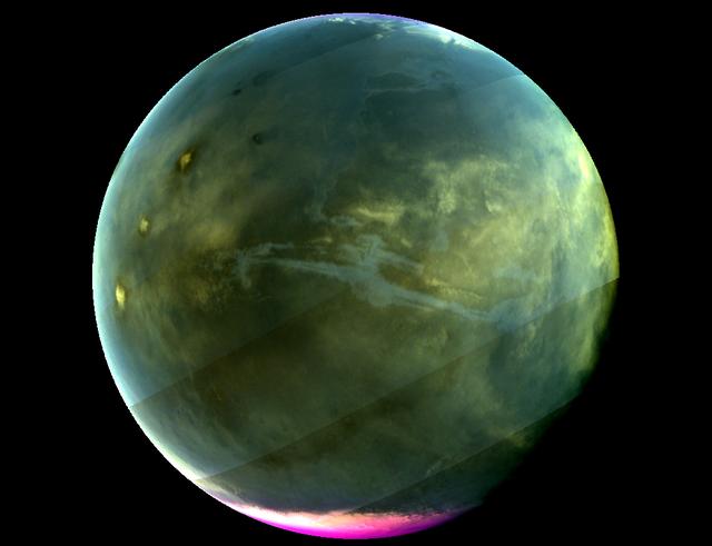 Caption: MAVEN's Imaging UltraViolet Spectrograph obtained this image of Mars on July 13, 2016, when the planet appeared nearly full when viewed from the highest altitudes in the MAVEN orbit. The ultraviolet colors of the planet have been rendered in false color, to show what we would see with ultraviolet-sensitive eyes. The ultraviolet (UV) view gives several new perspectives on Mars. Valles Marineris, a two-thousand-mile canyon system, appears prominently across the middle of the image as a blue gash. The deep canyon appears blue due to the scattering of ultraviolet light by the atmosphere, so strong that we cannot make out the bottom of the canyon. The greenish cast of the planet as a whole is a combination of the reflection of the surface plus the atmospheric scattering. The three tall Tharsis volcanoes appear near the left edge, dotted by white clouds forming as the winds flow over them. Bright white polar caps appear at both poles, typical for this season, in which there is a transition from southern-hemisphere winter to summer. The magenta-colored region visible at the south pole shows where ozone is absorbing ultraviolet light — the same property of ozone that protects life on Earth from harmful UV radiation. While ozone tends to be destroyed by chemical processes in the winter on Earth, different atmospheric chemistry at Mars caused it to build up in the winter there. A hint of ozone is also visible near the north pole; more will accumulate there as winter is coming. IUVS obtains images of Mars every orbit when the sunlit portion of the planet is visible from high altitude.  Credits: NASA/Goddard/University of Colorado/LASP  Read more: <a href="http://go.nasa.gov/2d9aU1N" rel="nofollow">go.nasa.gov/2d9aU1N</a>  Today, NASA’s Mars Atmosphere and Volatile EvolutioN (MAVEN) mission completed one Mars year of science observations. One Mars year is just under two Earth years.  MAVEN launched on Nov. 18, 2013, and went into orbit around Mars on Sept. 21, 2014. During its time at Mars, MAVEN has answered many questions about the Red Planet.  “Taken together, the MAVEN results tell us that loss of gas from the atmosphere to space has been the major force behind the climate having changed from a warm, wet environment to the cold, dry one that we see today,” said Bruce Jakosky, MAVEN principal investigator, from the University of Colorado in Boulder.  NASA recently declared that MAVEN had achieved mission success during its primary mission.  Mission success means that the spacecraft operated as intended, made the expected science measurements, and achieved its proposed science objectives.  <b><a href="http://www.nasa.gov/audience/formedia/features/MP_Photo_Guidelines.html" rel="nofollow">NASA image use policy.</a></b>  <b><a href="http://www.nasa.gov/centers/goddard/home/index.html" rel="nofollow">NASA Goddard Space Flight Center</a></b> enables NASA’s mission through four scientific endeavors: Earth Science, Heliophysics, Solar System Exploration, and Astrophysics. Goddard plays a leading role in NASA’s accomplishments by contributing compelling scientific knowledge to advance the Agency’s mission.  <b>Follow us on <a href="http://twitter.com/NASAGoddardPix" rel="nofollow">Twitter</a></b>  <b>Like us on <a href="http://www.facebook.com/pages/Greenbelt-MD/NASA-Goddard/395013845897?ref=tsd" rel="nofollow">Facebook</a></b>  <b>Find us on <a href="http://instagrid.me/nasagoddard/?vm=grid" rel="nofollow">Instagram</a></b>      