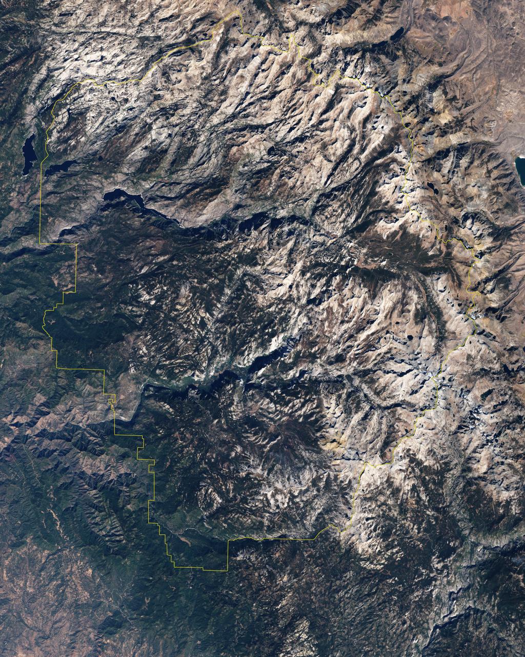 Naked summits alternate with forested lowlands in Yosemite Valley, part of California’s Yosemite National Park. During the Pleistocene Ice Age, glaciers sculpted the underlying rocks in this region, leaving behind canyons, waterfalls, rugged peaks, and granite domes. As the ice retreated, forests grew, but forests only extend as high as 2,900 meters (9,500 feet) above sea level. Above the tree line are rocky landscapes with sparse alpine vegetation. So from the sky, Yosemite Valley appears as a light-and-dark patchwork of forest, rock, and shadow.  The Enhanced Thematic Mapper Plus on NASA’s Landsat 7 satellite captured this true-color image of part of Yosemite Valley on August 18, 2001. The valley runs roughly east-west, and tall granite peaks lining the valley’s southern side cast long shadows across the valley floor. On the valley’s northern side, steep slopes appear almost white. Along the valley floor, roadways form narrow, meandering lines of off-white, past parking lots, buildings, and meadows.  On the north side of Yosemite Valley is El Capitan. Shooting straight up more than 915 meters (3,000 feet) above the valley floor, El Capitan is considered the largest granite monolith in the world. This granite monolith sits across the valley from Bridalveil Fall, one of the valley’s most prominent waterfalls.  Read more: <a href="http://go.nasa.gov/2bzGo3d" rel="nofollow">go.nasa.gov/2bzGo3d</a>  Credit: NASA/Landsat7   <b><a href="http://www.nasa.gov/audience/formedia/features/MP_Photo_Guidelines.html" rel="nofollow">NASA image use policy.</a></b>  <b><a href="http://www.nasa.gov/centers/goddard/home/index.html" rel="nofollow">NASA Goddard Space Flight Center</a></b> enables NASA’s mission through four scientific endeavors: Earth Science, Heliophysics, Solar System Exploration, and Astrophysics. Goddard plays a leading role in NASA’s accomplishments by contributing compelling scientific knowledge to advance the Agency’s mission.  <b>Follow us on <a href="http://twitter.com/NASAGoddardPix" rel="nofollow">Twitter</a></b>  <b>Like us on <a href="http://www.facebook.com/pages/Greenbelt-MD/NASA-Goddard/395013845897?ref=tsd" rel="nofollow">Facebook</a></b>  <b>Find us on <a href="http://instagrid.me/nasagoddard/?vm=grid" rel="nofollow">Instagram</a></b>    