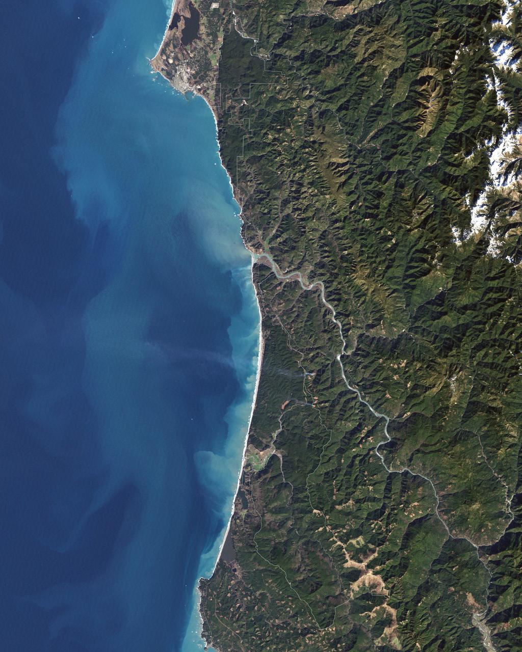 In 1968, after state parks had already been established in northern California, the U.S. Congress established Redwood National Park. This new park supplemented protected lands in the region, and in 1994, state and federal authorities agreed to jointly manage the area’s public lands.  On February 6, 2003, the Enhanced Thamatic Mapper Plus on NASA’s Landsat 7 satellite captured this true-color image of the southern end of Redwood National Park - a thin coastal corridor connects the northern and southern ends of the park system. Along the coast, sandy beaches appear off-white, and sediments form swirls of pale blue in the darker blue sea. Inland, the park is dominated by green vegetation, with isolated patches of gray-beige rock.  This image of the Redwood National Park includes two stands of trees: Lady Bird Johnson Grove and Tall Trees Grove. The first grove was dedicated to the former first lady by President Richard Nixon in August 1969. The second grove became the focus of efforts to protect the surrounding area from logging. Two waterways appear in this image: Redwood Creek and Klamath River. The more conspicuous Klamath River flows through the park system’s midsection (north of the area pictured here). Redwood Creek flows through the southern portion of the park system. Both waterways have carved gorges through the mountainous landscape.  Redwood National and State Parks occupy an area considered to be the most seismically active in the United States. The frequent seismic activity has led to shifting waterways, landslides, and rapid erosion along the coastline.  Read more: <a href="http://go.nasa.gov/2bRlryv" rel="nofollow">go.nasa.gov/2bRlryv</a>  Credit: NASA/Landsat7   <b><a href="http://www.nasa.gov/audience/formedia/features/MP_Photo_Guidelines.html" rel="nofollow">NASA image use policy.</a></b>  <b><a href="http://www.nasa.gov/centers/goddard/home/index.html" rel="nofollow">NASA Goddard Space Flight Center</a></b> enables NASA’s mission through four scientific endeavors: Earth Science, Heliophysics, Solar System Exploration, and Astrophysics. Goddard plays a leading role in NASA’s accomplishments by contributing compelling scientific knowledge to advance the Agency’s mission.  <b>Follow us on <a href="http://twitter.com/NASAGoddardPix" rel="nofollow">Twitter</a></b>  <b>Like us on <a href="http://www.facebook.com/pages/Greenbelt-MD/NASA-Goddard/395013845897?ref=tsd" rel="nofollow">Facebook</a></b>  <b>Find us on <a href="http://instagrid.me/nasagoddard/?vm=grid" rel="nofollow">Instagram</a></b>    