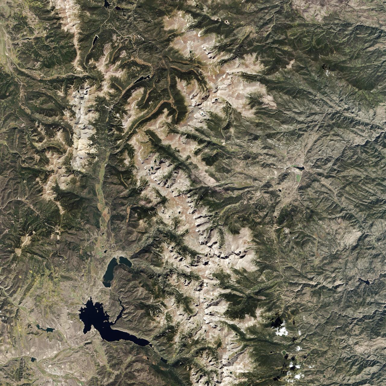 Colorado’s Rocky Mountain National Park presents a very different landscape in summertime than in wintertime. Snow retreats and gives way to blooms of wildflowers, even at high elevations. Roads and trails become accessible, allowing visitors easier access to the rugged mountain trails and vistas.  The diversity of the park’s landscape is visible in this image, acquired on September 20, 2014, with the Operational Land Imager (OLI) on the Landsat 8 satellite. Except for a few patches, seasonal snow is mostly gone. Even the “Never Summer Mountains”—a range along the park’s northwest border known to receive snow any time of year—appears to be temporarily snow-free.  Read more: <a href="http://go.nasa.gov/29Rmz4Y" rel="nofollow">go.nasa.gov/29Rmz4Y</a>  Credit: NASA/Landsat8   <b><a href="http://www.nasa.gov/audience/formedia/features/MP_Photo_Guidelines.html" rel="nofollow">NASA image use policy.</a></b>  <b><a href="http://www.nasa.gov/centers/goddard/home/index.html" rel="nofollow">NASA Goddard Space Flight Center</a></b> enables NASA’s mission through four scientific endeavors: Earth Science, Heliophysics, Solar System Exploration, and Astrophysics. Goddard plays a leading role in NASA’s accomplishments by contributing compelling scientific knowledge to advance the Agency’s mission.  <b>Follow us on <a href="http://twitter.com/NASAGoddardPix" rel="nofollow">Twitter</a></b>  <b>Like us on <a href="http://www.facebook.com/pages/Greenbelt-MD/NASA-Goddard/395013845897?ref=tsd" rel="nofollow">Facebook</a></b>  <b>Find us on <a href="http://instagrid.me/nasagoddard/?vm=grid" rel="nofollow">Instagram</a></b>     