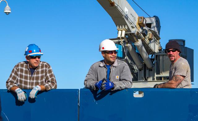 Three members of the Atlantis crew take a breather along the side of the ship. The crane in the background is permanently affixed to the rear deck of the ship. --- The <b><a href="http://naames.larc.nasa.gov/" rel="nofollow">North Atlantic Aerosols and Marine Ecosystems Study </a></b> (NAAMES) is a five year investigation to resolve key processes controlling ocean system function, their influences on atmospheric aerosols and clouds and their implications for climate. Michael Starobin joined the NAAMES field campaign on behalf of Earth Expeditions and NASA Goddard Space Flight Center’s Office of Communications. He presented stories about the important, multi-disciplinary research being conducted by the NAAMES team, with an eye towards future missions on the NASA drawing board. This is a NAAMES photo essay put together by Starobin, a collection of 49 photographs and captions. Photo and Caption Credit: Michael Starobin <b><a href="http://www.nasa.gov/audience/formedia/features/MP_Photo_Guidelines.html" rel="nofollow">NASA image use policy</a></b> <b><a href="http://www.nasa.gov/centers/goddard/home/index.html" rel="nofollow">NASA Goddard Space Flight Center</a></b> enables NASA’s mission through four scientific endeavors: Earth Science, Heliophysics, Solar System Exploration, and Astrophysics. Goddard plays a leading role in NASA’s accomplishments by contributing compelling scientific knowledge to advance the Agency’s mission. <b>Follow us on <a href="http://twitter.com/NASAGoddardPix" rel="nofollow">Twitter</a></b> <b>Like us on <a href="http://www.facebook.com/pages/Greenbelt-MD/NASA-Goddard/395013845897?ref=tsd" rel="nofollow">Facebook</a></b> <b>Find us on <a href="https://www.instagram.com/nasagoddard/?hl=en" rel="nofollow">Instagram</a></b>