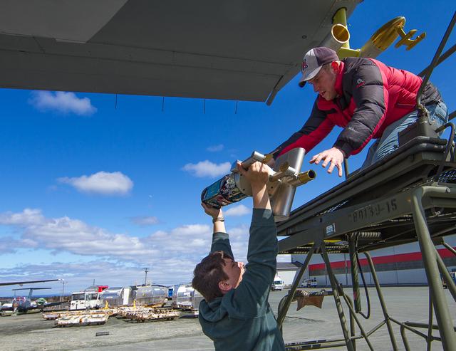 Scientists and engineers regularly tweaked and tested specialized equipment attached to the C130. Here two of the NAAMES team are inspecting a cloud probe that typically hangs on the wingtip of the plane.  ---  The <b><a href="http://naames.larc.nasa.gov/" rel="nofollow">North Atlantic Aerosols and Marine Ecosystems Study </a></b> (NAAMES) is a five year investigation to resolve key processes controlling ocean system function, their influences on atmospheric aerosols and clouds and their implications for climate.  Michael Starobin joined the NAAMES field campaign on behalf of Earth Expeditions and NASA Goddard Space Flight Center’s Office of Communications. He presented stories about the important, multi-disciplinary research being conducted by the NAAMES team, with an eye towards future missions on the NASA drawing board. This is a NAAMES photo essay put together by Starobin, a collection of 49 photographs and captions.  Photo and Caption Credit: Michael Starobin   <b><a href="http://www.nasa.gov/audience/formedia/features/MP_Photo_Guidelines.html" rel="nofollow">NASA image use policy</a></b>  <b><a href="http://www.nasa.gov/centers/goddard/home/index.html" rel="nofollow">NASA Goddard Space Flight Center</a></b> enables NASA’s mission through four scientific endeavors: Earth Science, Heliophysics, Solar System Exploration, and Astrophysics. Goddard plays a leading role in NASA’s accomplishments by contributing compelling scientific knowledge to advance the Agency’s mission.  <b>Follow us on <a href="http://twitter.com/NASAGoddardPix" rel="nofollow">Twitter</a></b>  <b>Like us on <a href="http://www.facebook.com/pages/Greenbelt-MD/NASA-Goddard/395013845897?ref=tsd" rel="nofollow">Facebook</a></b>  <b>Find us on <a href="https://www.instagram.com/nasagoddard/?hl=en" rel="nofollow">Instagram</a></b> 