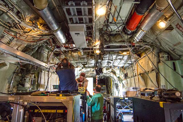 Inside the expansive cargo plane visitor’s immediately discover that that every available surface has been utilized to maximize the plane as a flying laboratory. Wires, conduits and specialized hardware take up nearly every inch of the cabin area. --- The <b><a href="http://naames.larc.nasa.gov/" rel="nofollow">North Atlantic Aerosols and Marine Ecosystems Study </a></b> (NAAMES) is a five year investigation to resolve key processes controlling ocean system function, their influences on atmospheric aerosols and clouds and their implications for climate. Michael Starobin joined the NAAMES field campaign on behalf of Earth Expeditions and NASA Goddard Space Flight Center’s Office of Communications. He presented stories about the important, multi-disciplinary research being conducted by the NAAMES team, with an eye towards future missions on the NASA drawing board. This is a NAAMES photo essay put together by Starobin, a collection of 49 photographs and captions. Photo and Caption Credit: Michael Starobin <b><a href="http://www.nasa.gov/audience/formedia/features/MP_Photo_Guidelines.html" rel="nofollow">NASA image use policy</a></b> <b><a href="http://www.nasa.gov/centers/goddard/home/index.html" rel="nofollow">NASA Goddard Space Flight Center</a></b> enables NASA’s mission through four scientific endeavors: Earth Science, Heliophysics, Solar System Exploration, and Astrophysics. Goddard plays a leading role in NASA’s accomplishments by contributing compelling scientific knowledge to advance the Agency’s mission. <b>Follow us on <a href="http://twitter.com/NASAGoddardPix" rel="nofollow">Twitter</a></b> <b>Like us on <a href="http://www.facebook.com/pages/Greenbelt-MD/NASA-Goddard/395013845897?ref=tsd" rel="nofollow">Facebook</a></b> <b>Find us on <a href="https://www.instagram.com/nasagoddard/?hl=en" rel="nofollow">Instagram</a></b>