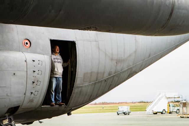 Luke Ziemba rides in the doorway as the C130 makes its way into a hangar in St. Johns Canada. He’s the logistics and C130 platform manager. --- The <b><a href="http://naames.larc.nasa.gov/" rel="nofollow">North Atlantic Aerosols and Marine Ecosystems Study </a></b> (NAAMES) is a five year investigation to resolve key processes controlling ocean system function, their influences on atmospheric aerosols and clouds and their implications for climate. Michael Starobin joined the NAAMES field campaign on behalf of Earth Expeditions and NASA Goddard Space Flight Center’s Office of Communications. He presented stories about the important, multi-disciplinary research being conducted by the NAAMES team, with an eye towards future missions on the NASA drawing board. This is a NAAMES photo essay put together by Starobin, a collection of 49 photographs and captions. Photo and Caption Credit: Michael Starobin <b><a href="http://www.nasa.gov/audience/formedia/features/MP_Photo_Guidelines.html" rel="nofollow">NASA image use policy</a></b> <b><a href="http://www.nasa.gov/centers/goddard/home/index.html" rel="nofollow">NASA Goddard Space Flight Center</a></b> enables NASA’s mission through four scientific endeavors: Earth Science, Heliophysics, Solar System Exploration, and Astrophysics. Goddard plays a leading role in NASA’s accomplishments by contributing compelling scientific knowledge to advance the Agency’s mission. <b>Follow us on <a href="http://twitter.com/NASAGoddardPix" rel="nofollow">Twitter</a></b> <b>Like us on <a href="http://www.facebook.com/pages/Greenbelt-MD/NASA-Goddard/395013845897?ref=tsd" rel="nofollow">Facebook</a></b> <b>Find us on <a href="https://www.instagram.com/nasagoddard/?hl=en" rel="nofollow">Instagram</a></b>